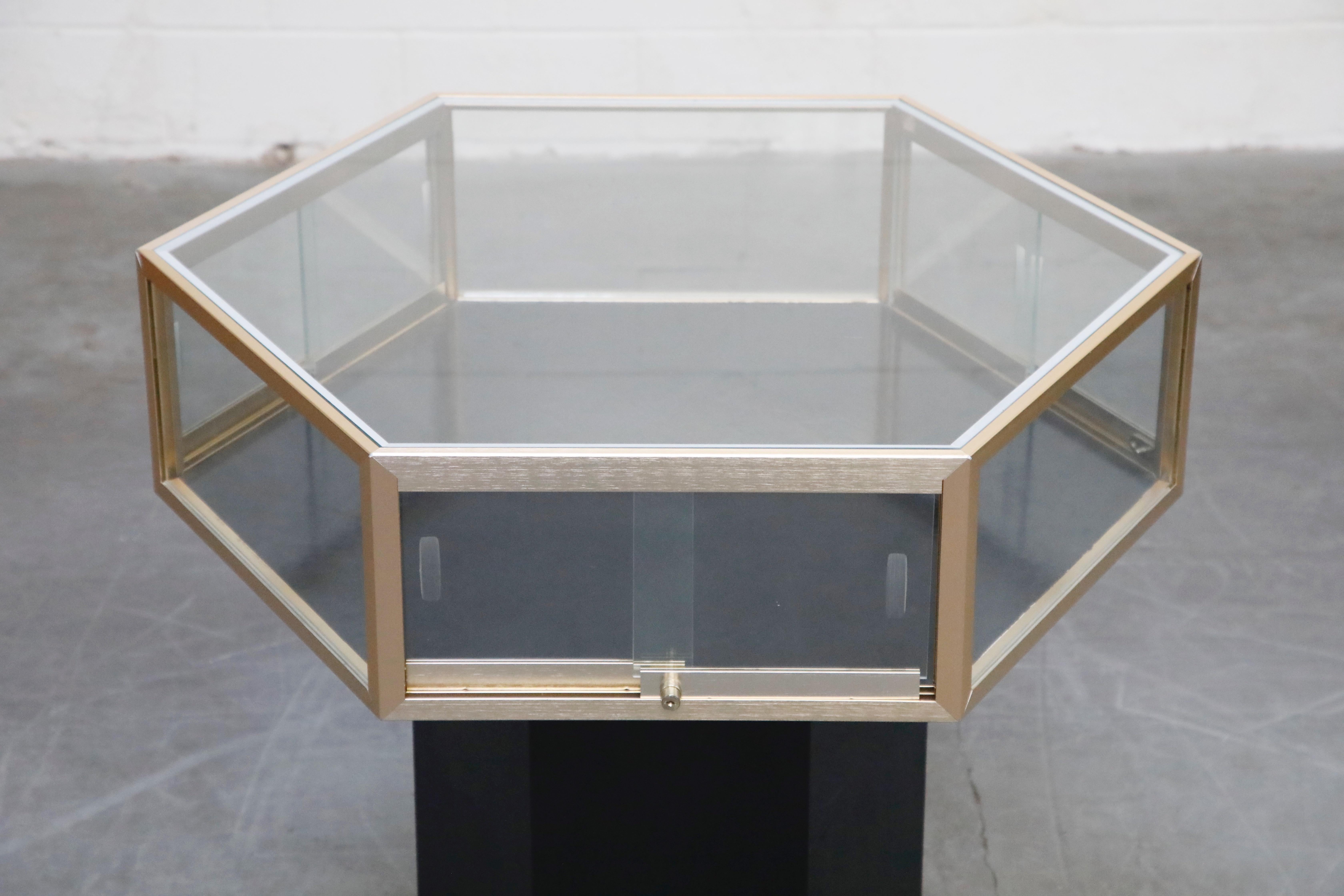 Brass and Glass Hexagonal Display Showcase Center Table, circa 1970s 1