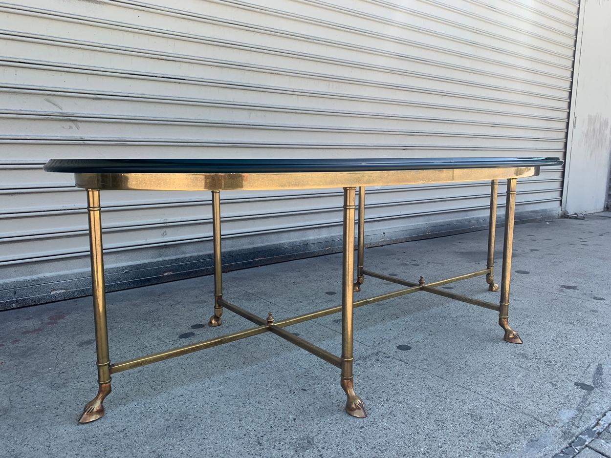 Hollywood Regency Brass and Glass Hooved Feet Coffee Table by La Barge