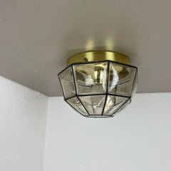 Brass and glass "Iron Rings" ceiling Light by Glashütte Limburg, Germany, 1970s