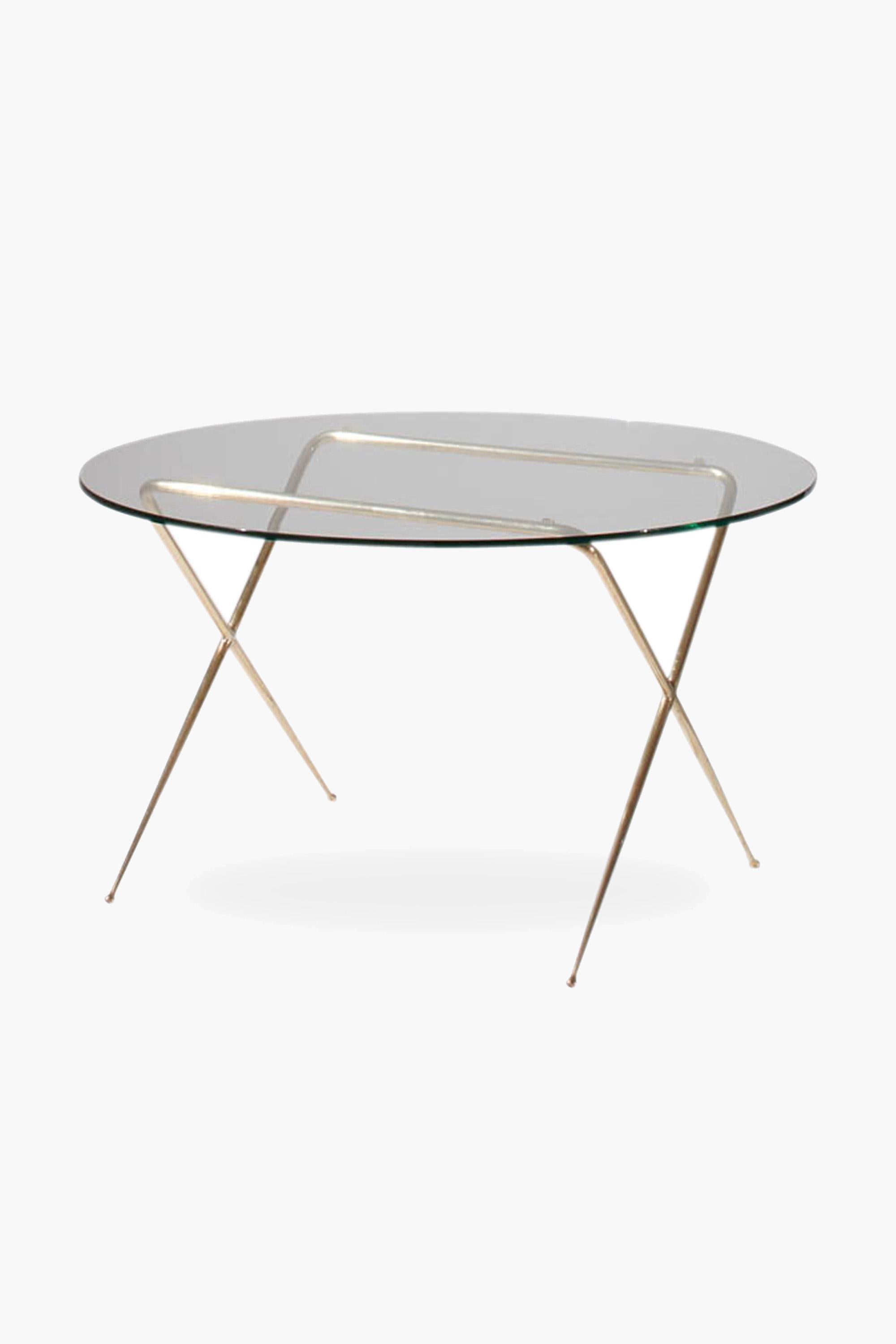 Brass and glass low table by Angelo Lelii

The same frame design was used for a magazine rack, Model n°13007, published in 