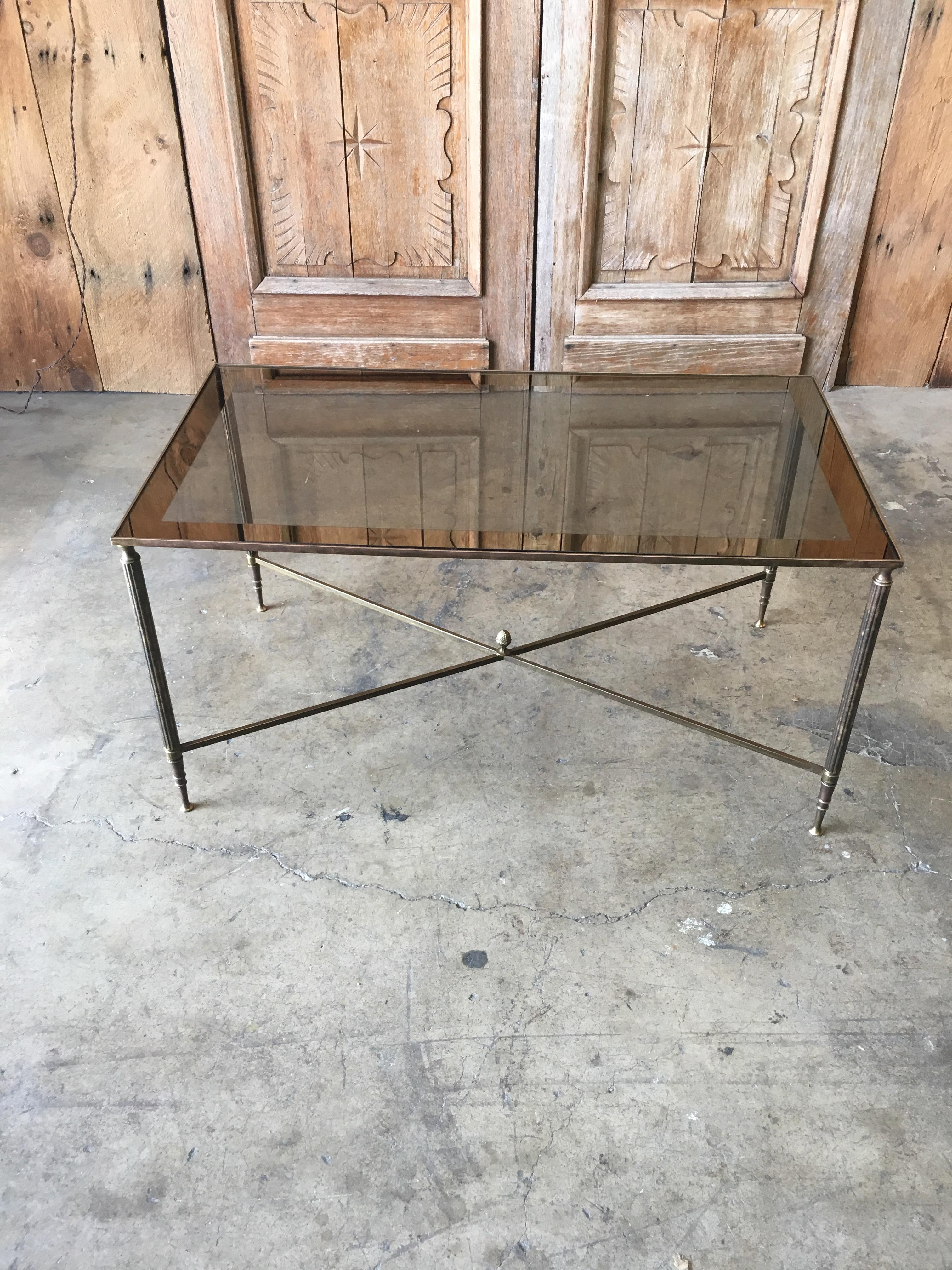 Brass with mirrored edge glass neoclassical style coffee table, attributed to Maison Jansen