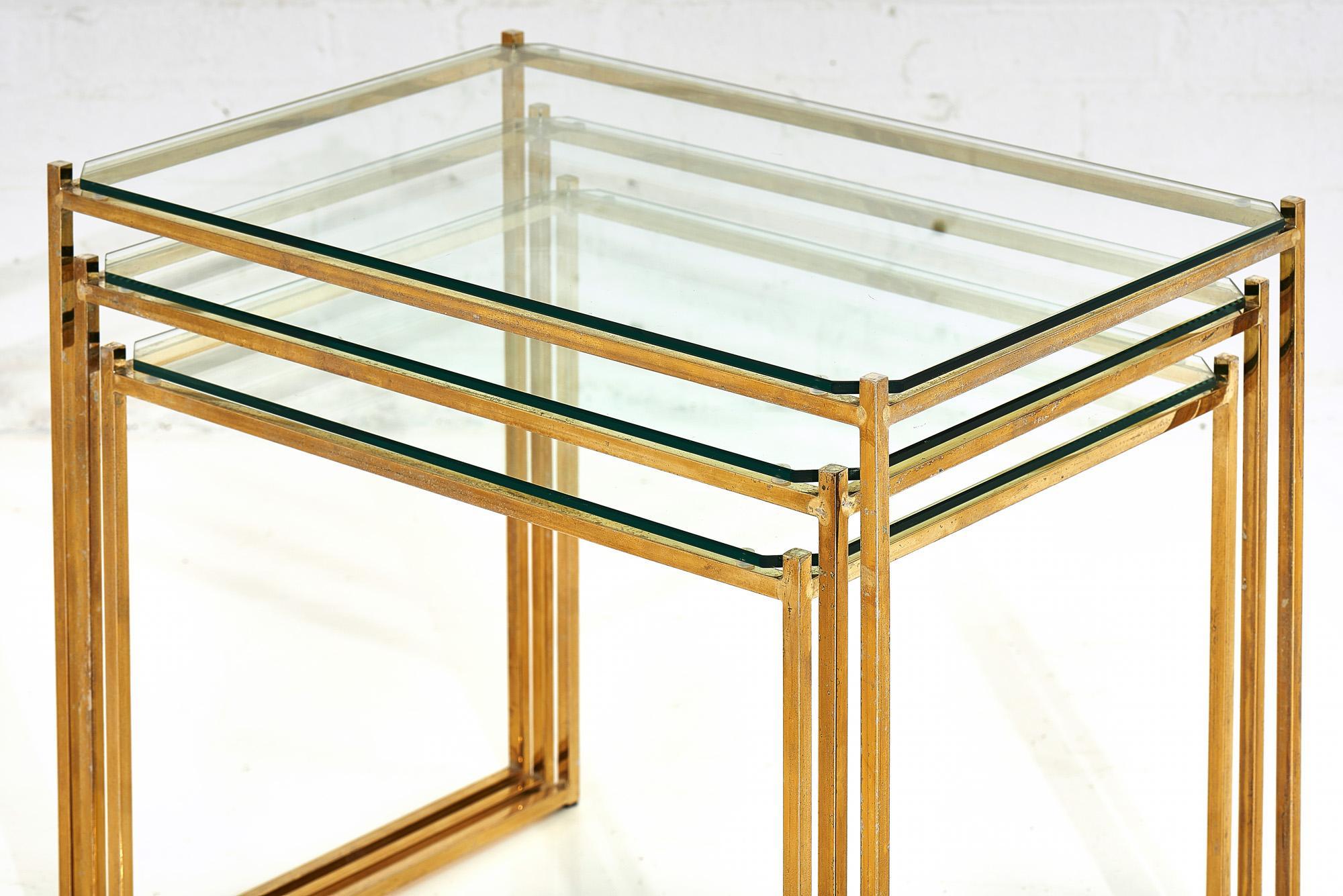 Late 20th Century Brass and Glass Nesting Tables by Guy Lefevre for Maison Jansen, circa 1970