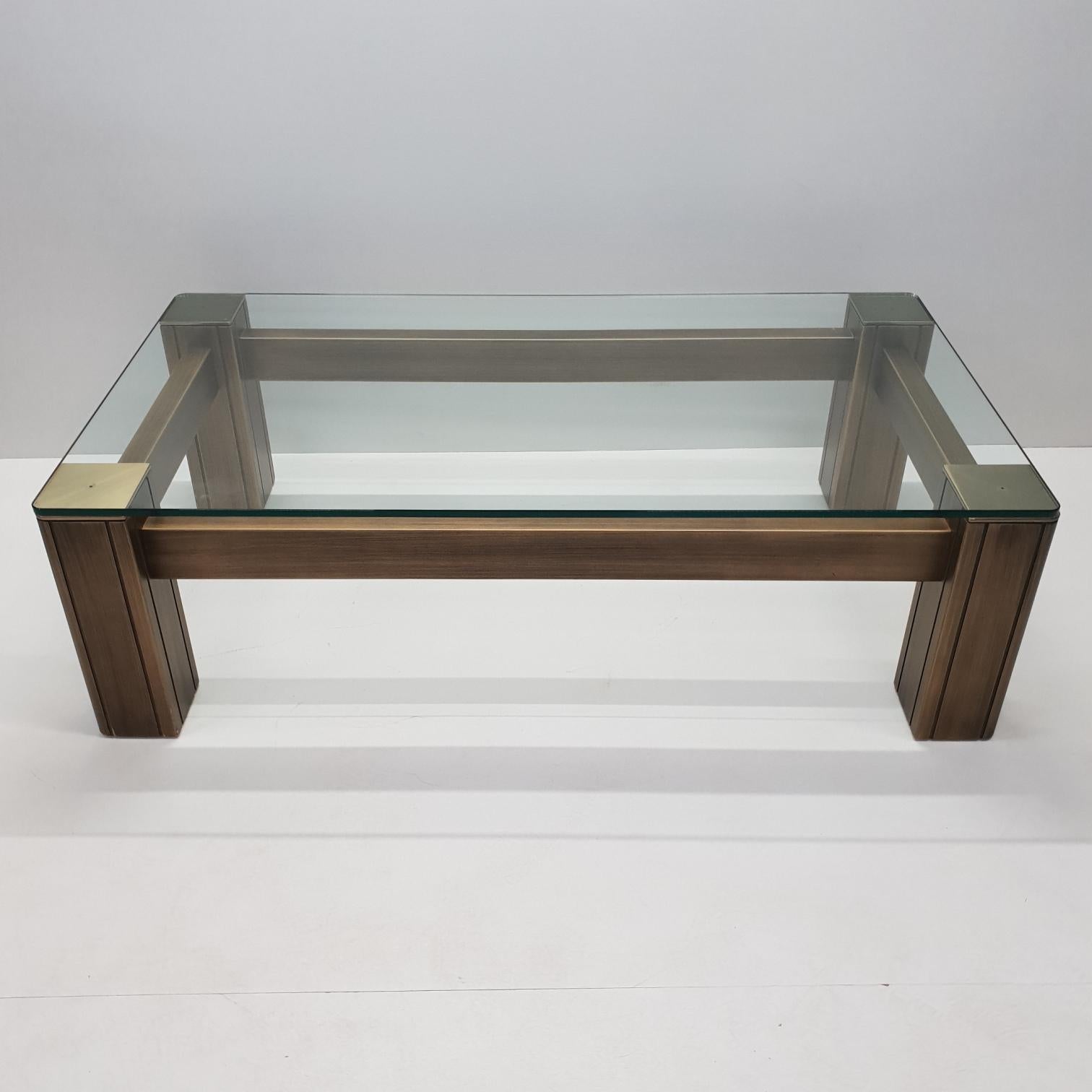 Brass and glass rectangular robust coffee table, 1990s.
Size: 12mm thick glass plate.