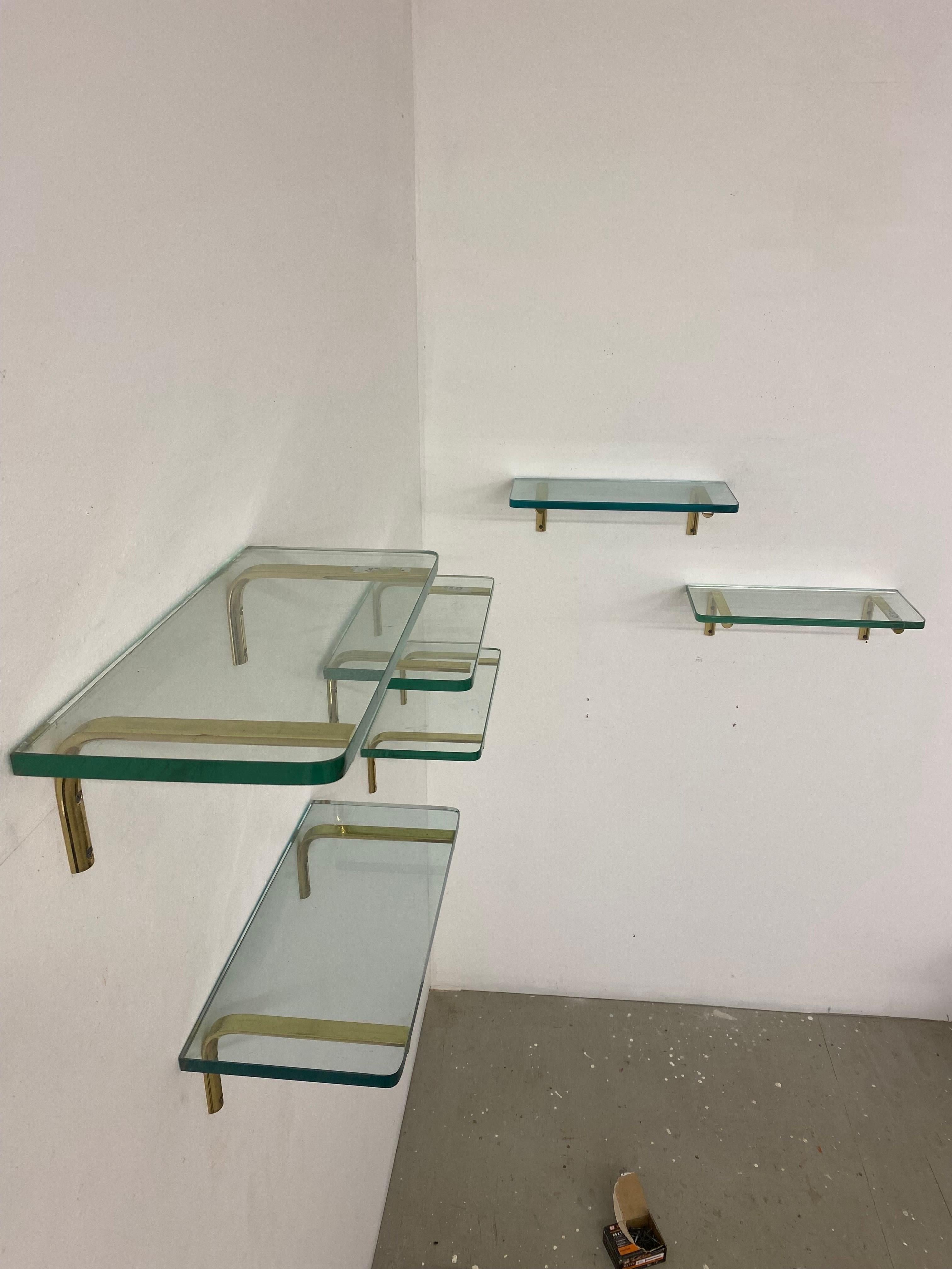 Set of 6 Brass and Glass Shelves.  Very nice detailed brass brackets with 3/4