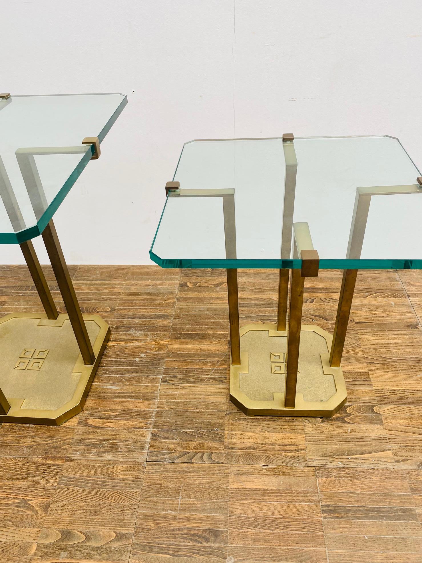 Brass and glass side table by Peter Ghyczy, 1970s
 The sand cast base of the side tables, in solid brass, features the Ghyczy logo
Measures: Large : H : 51cm L: 50 cm D: 50cm 
Small : H : 45b L: 40cm D: 40cm.
   