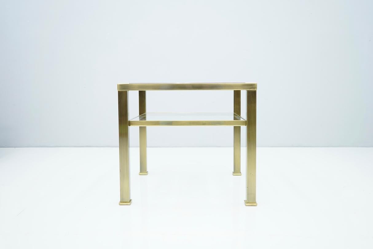 Brass and glass side table in style of Maison Jansen, France, 1970s

Very good condition.