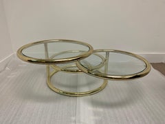 Brass and Glass Tiered Swivel Cocktail Table