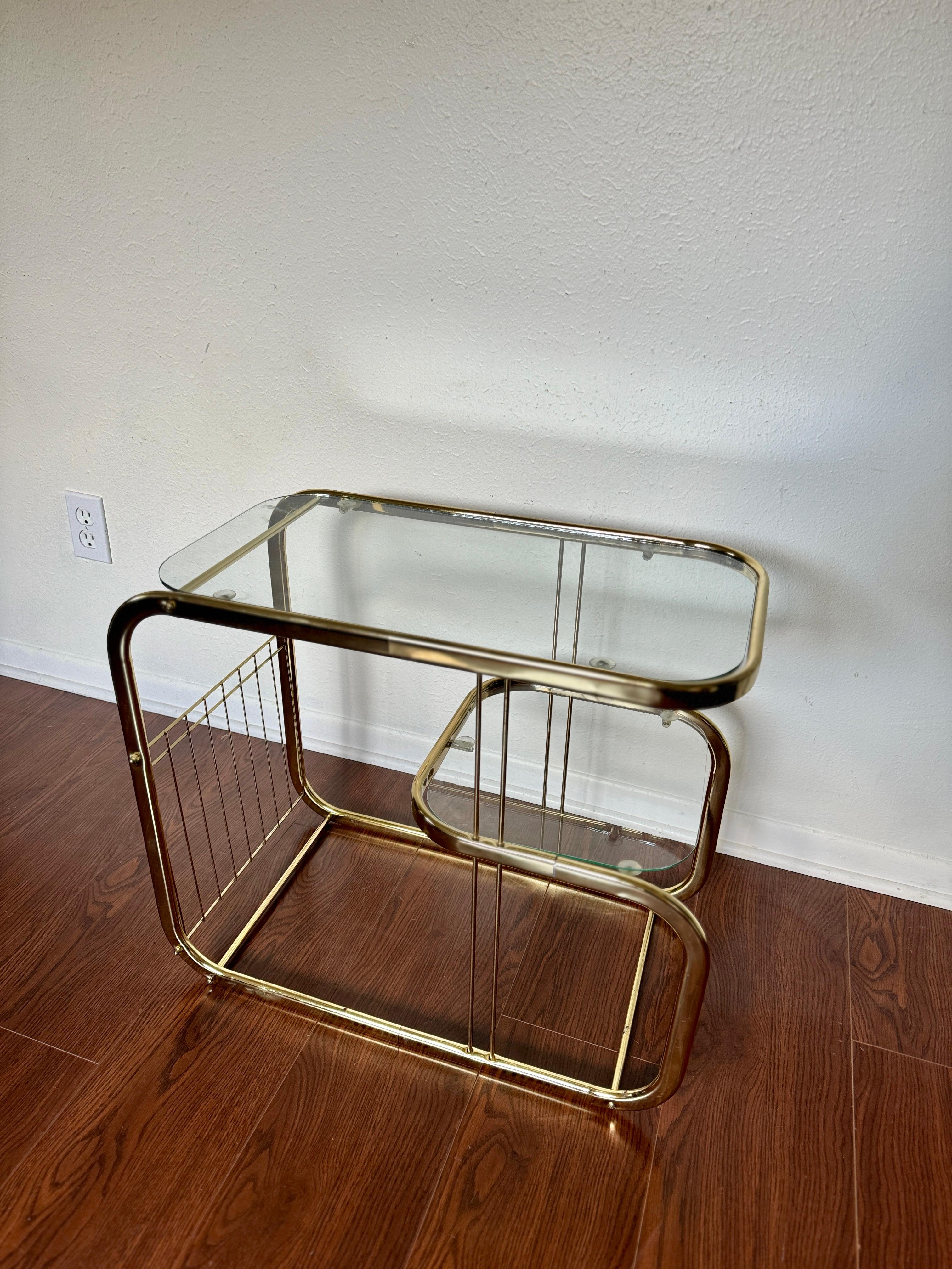 Brass and glass vintage bar cart in the style of Milo Baughman. 9