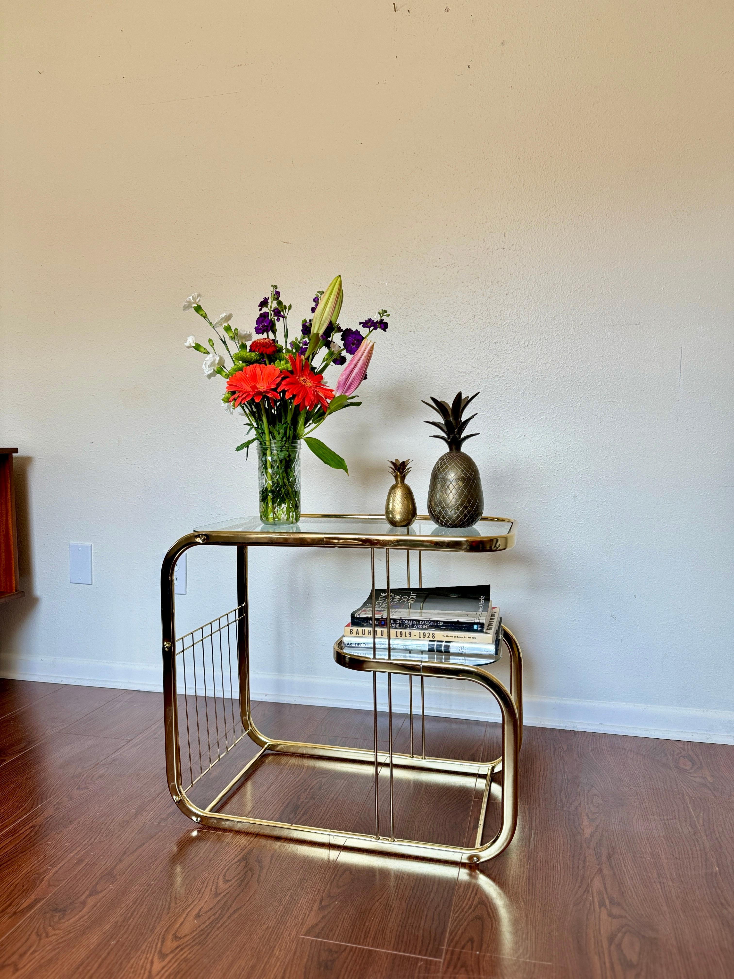 Brass and glass vintage bar cart in the style of Milo Baughman. 1