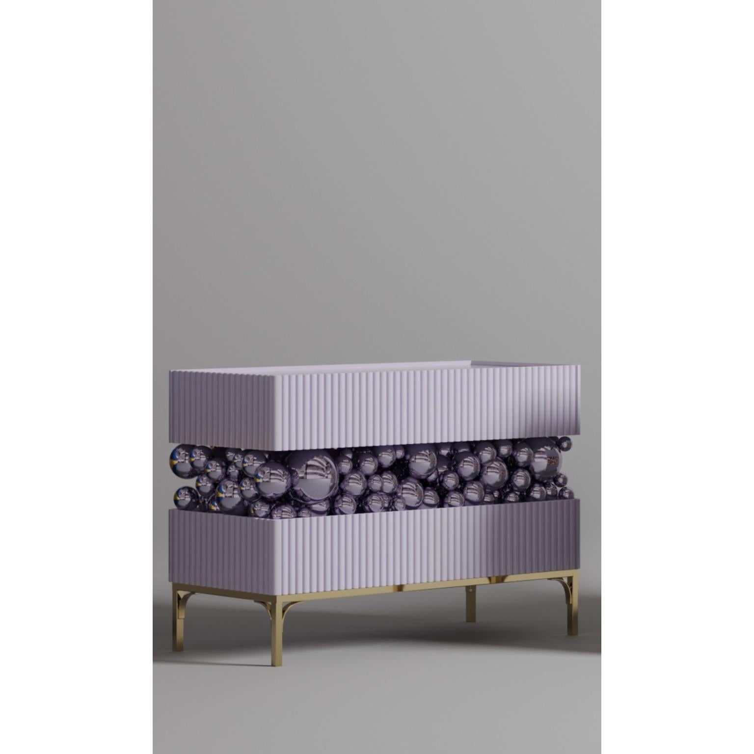 Brass And Gloss Paint Bubbles Decorative Sideboard by PANOPTIKUM COLLECTIONS
Dimensions: D 50 x W 120 x H 85 cm.
Materials: MDF, brass, gloss paint, and LED lighting.

The “Bubbles collection” is an emotional design that appeals to our inner child.