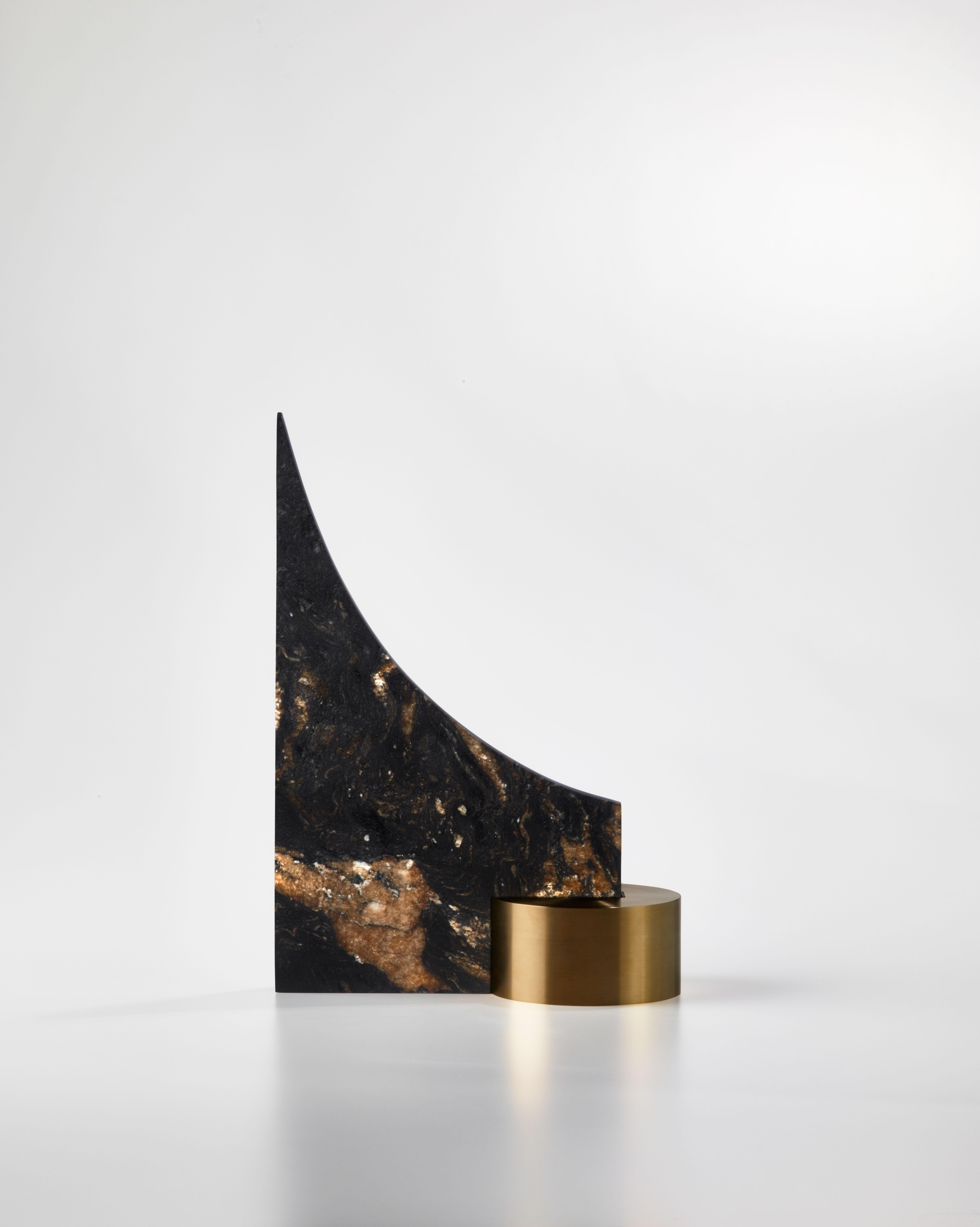 Brass and granite bookend, signed William Guillon
Signed William Guillon
Limited edition of 20
Signed and numbered
Barocco granite, solid brass
Dimensions: H 30 cm x W 22 cm x D 12 cm
Handsculpted in France

At the crossroads between his