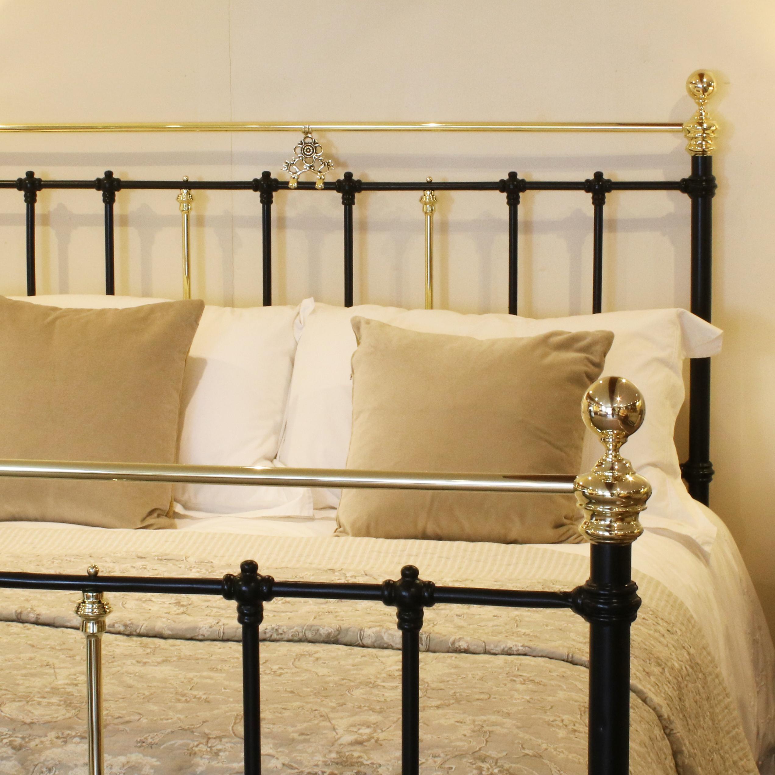 5ft black bed with straight brass top-rail and decorative brass castings.

This bed accepts a British King Size or American Queen Size (5ft wide, 60 inches or 150cm) base and mattress set.

The price is for the bed frame alone. The base, mattress,