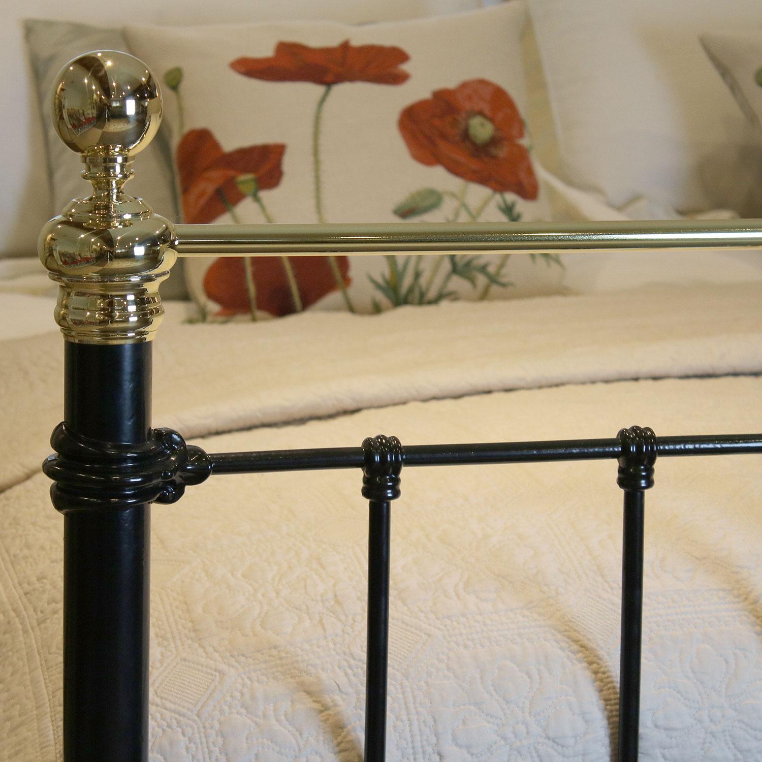 black and brass bed