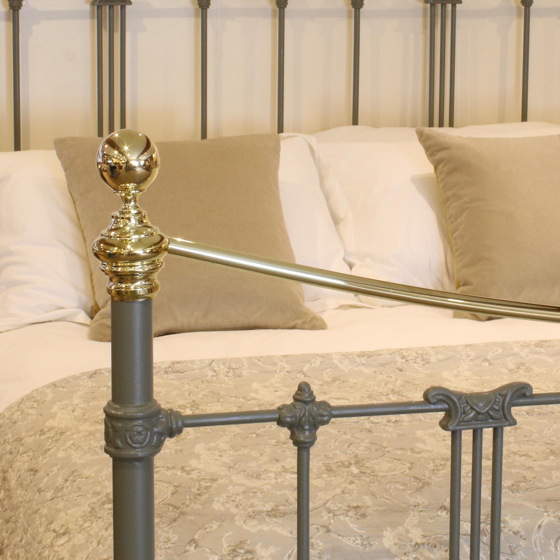 An antique brass and iron bed finished in green smoke with decorative castings and curved brass top rail.

This bed accepts a British King Size or American Queen Size (5ft wide, 60 inches or 150cm) base and mattress set.

The price is for the bed