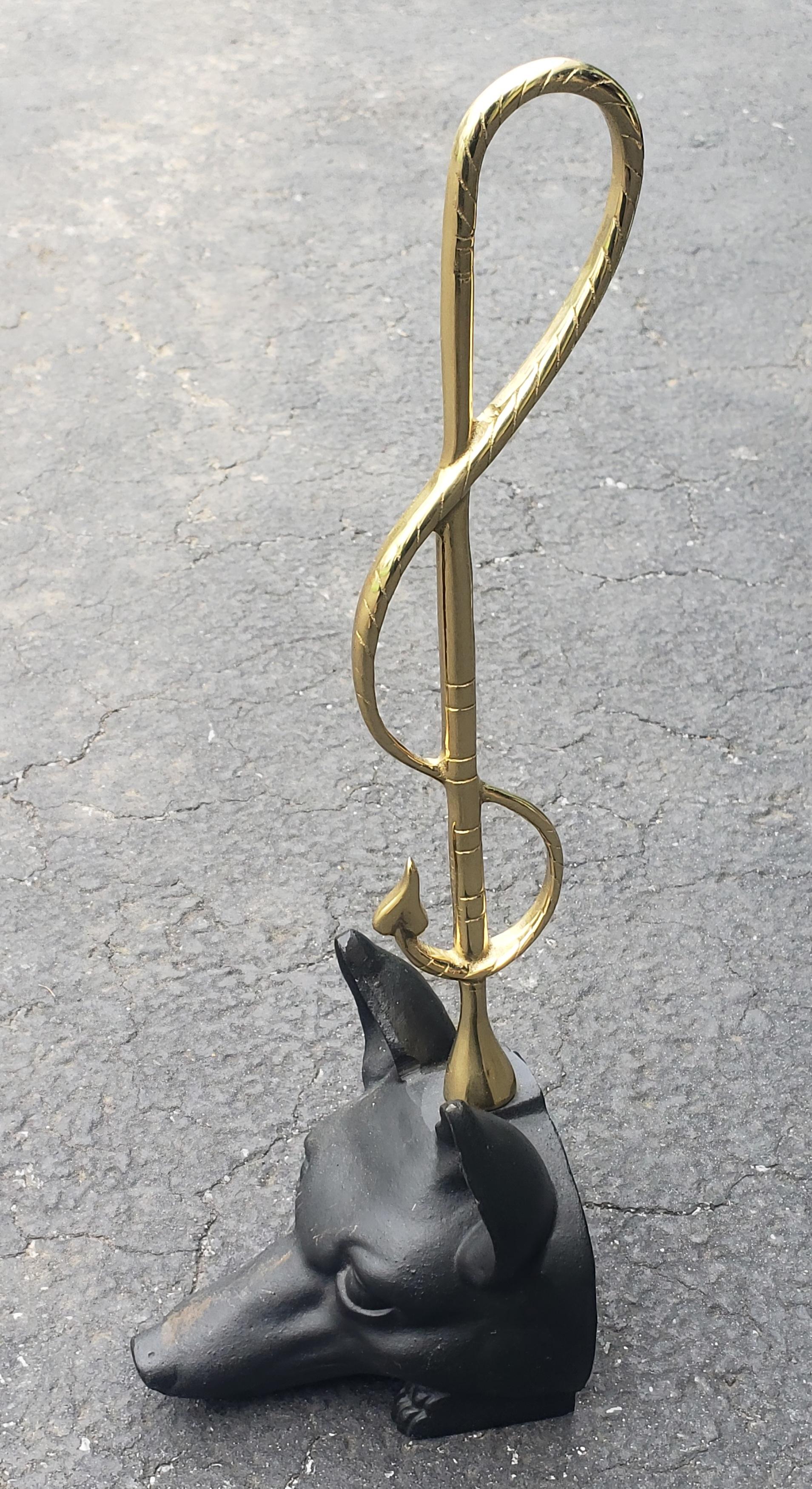 A stylish Edwardian design Brass and Iron Door Stop with Fox Head and Riding Crop in great vintage condition. Measures 4.5