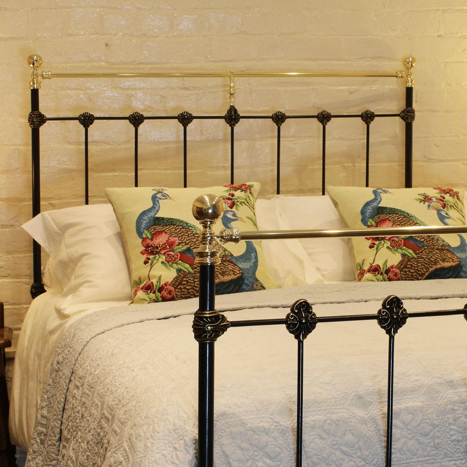 Brass and cast iron bed in black with decorative moldings. Beautifully painted gold lining to emphasize the rich details within the castings.

This bed accepts a double size base and mattress set (4ft 6