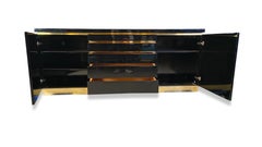 Brass and lacquer sideboard by Jean Claude Mahey, 1970s