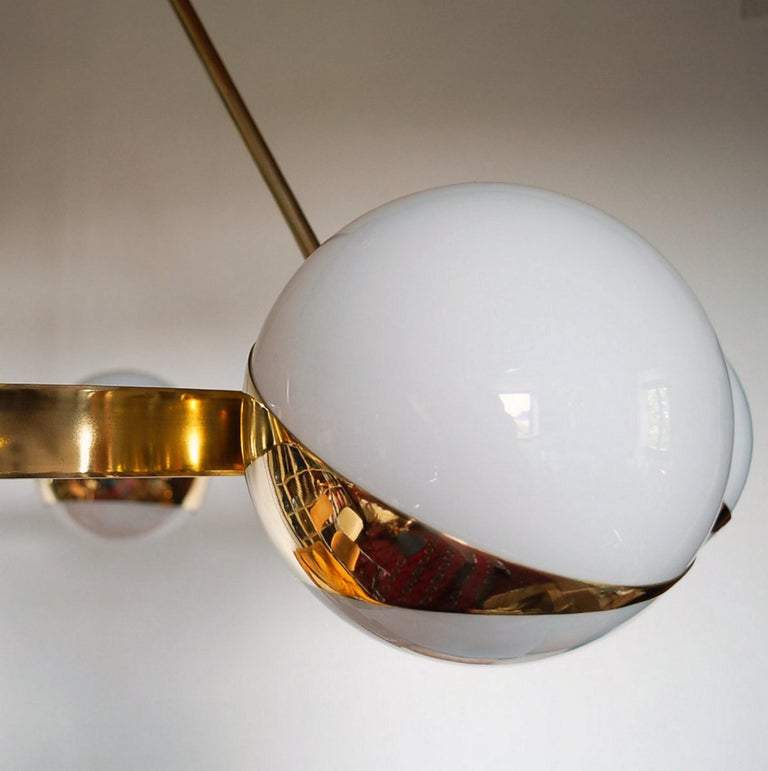 Brass and lattimo glass chandelier, 9 spheres Stilnovo Designed for light output 9