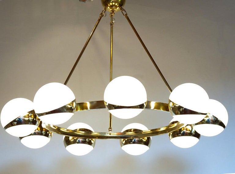 Mid-Century Modern Brass and lattimo glass chandelier, 9 spheres Stilnovo Designed for light output