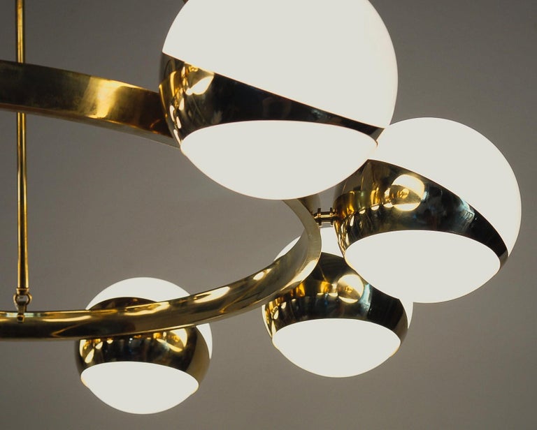 Metal Brass and lattimo glass chandelier, 9 spheres Stilnovo Designed for light output
