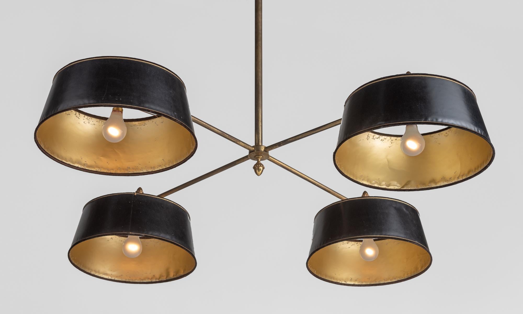 Brass and leather Billiard lights, France, circa 1950.

Includes original leather shades with gilded interiors and brass detailing.