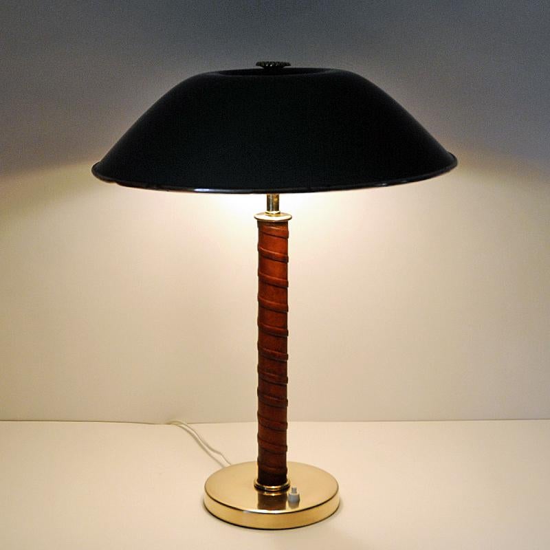 Swedish Brass and Leather Table Lamp by NK, 1940s, Sweden