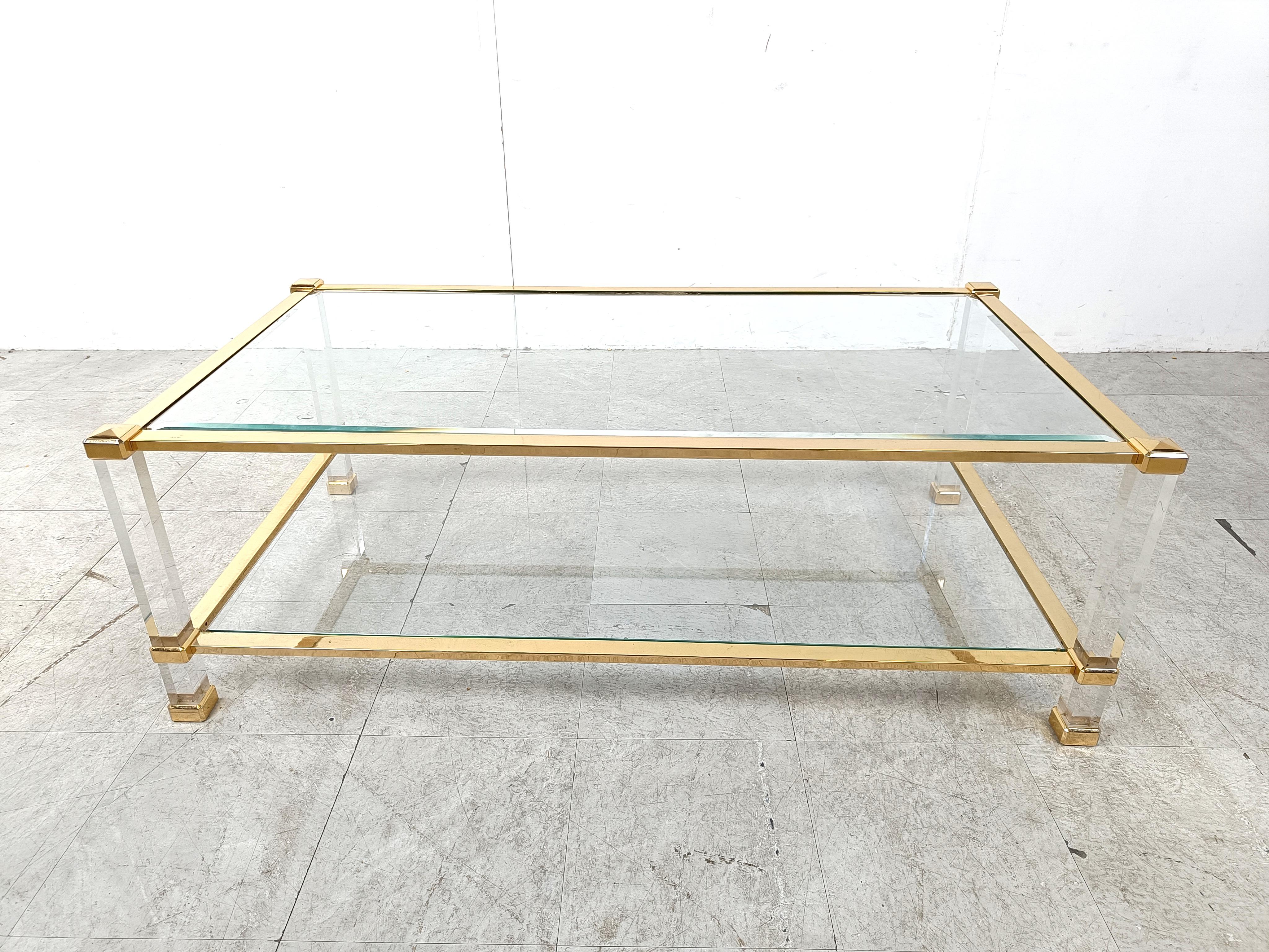 French Brass and lucite coffee table, 1970s For Sale
