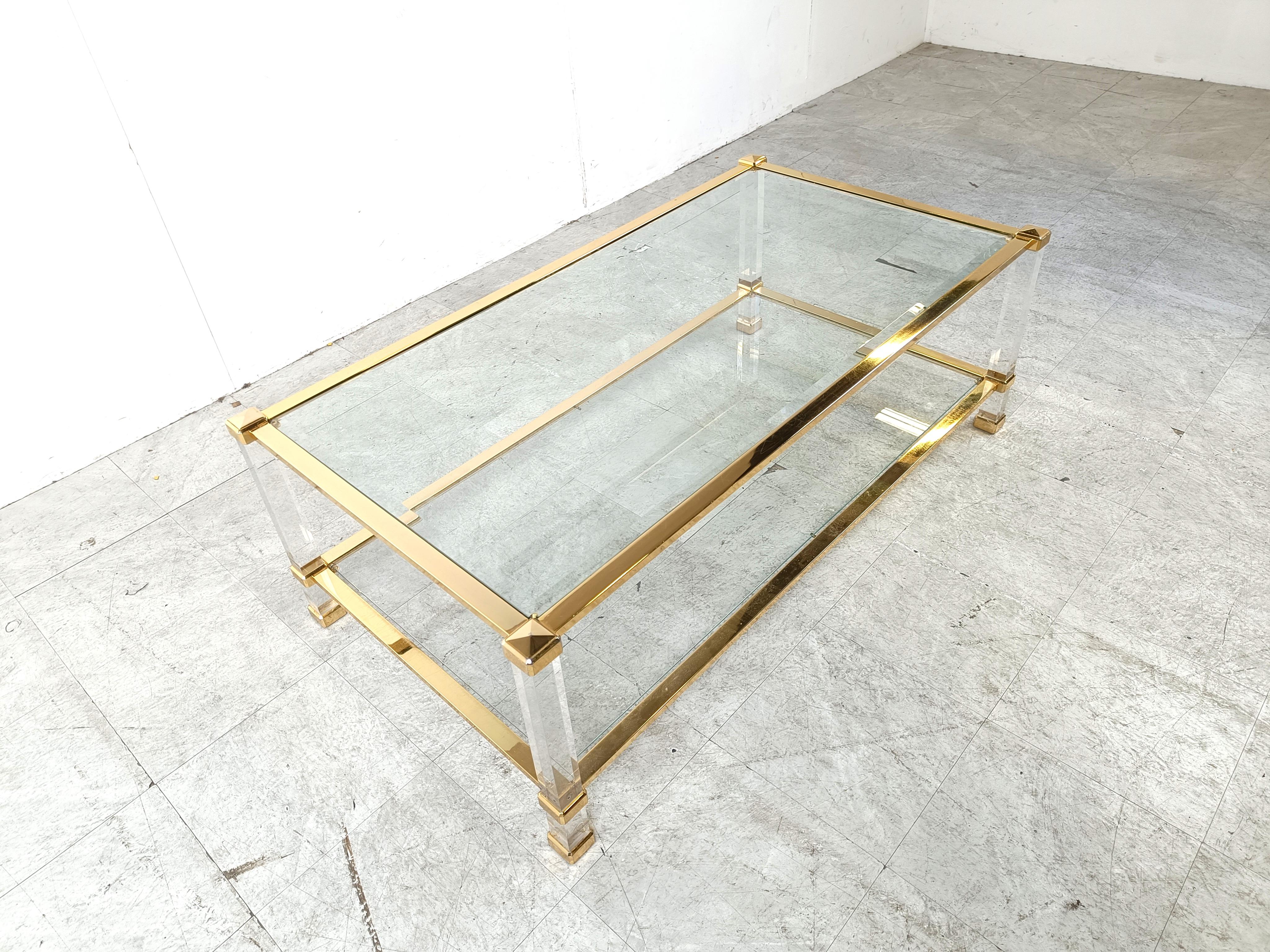 Late 20th Century Brass and lucite coffee table, 1970s For Sale