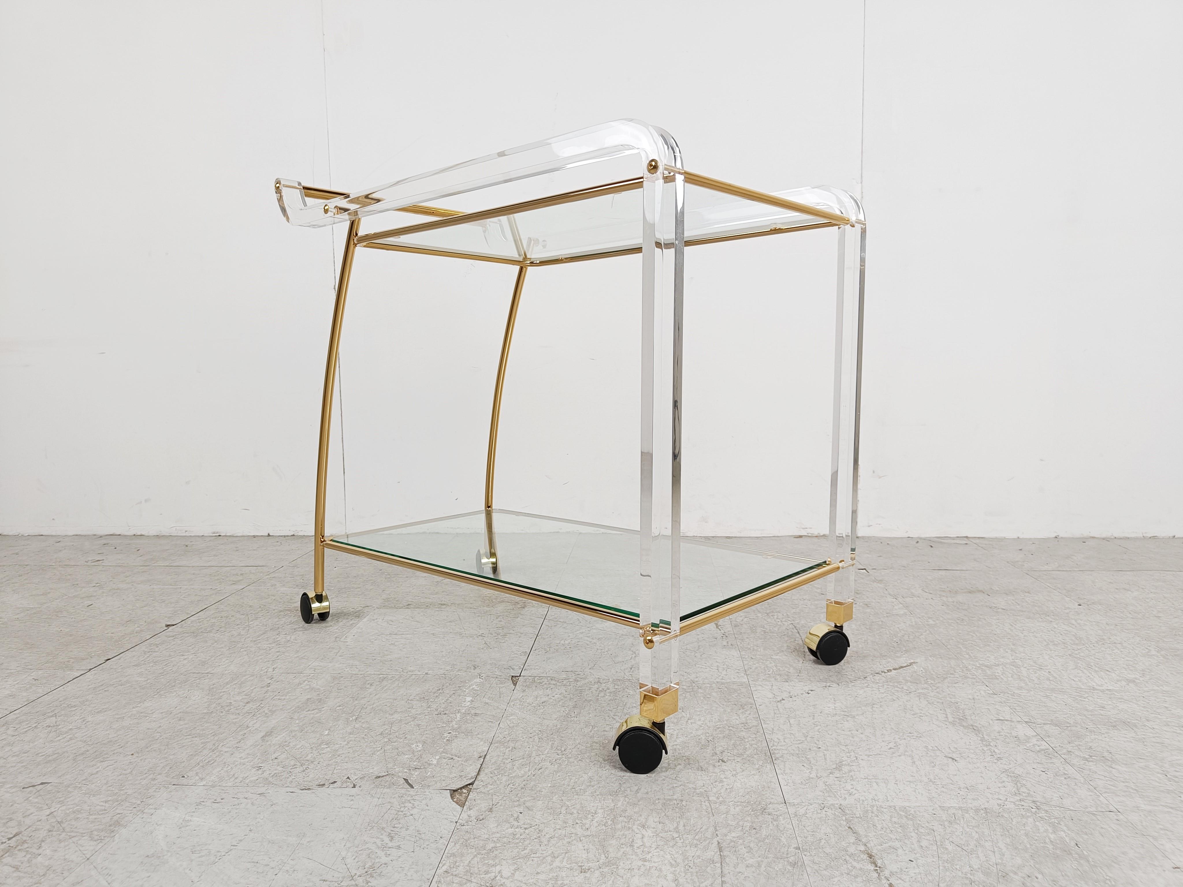Late 20th Century Brass and lucite drinks trolley, 1970s For Sale