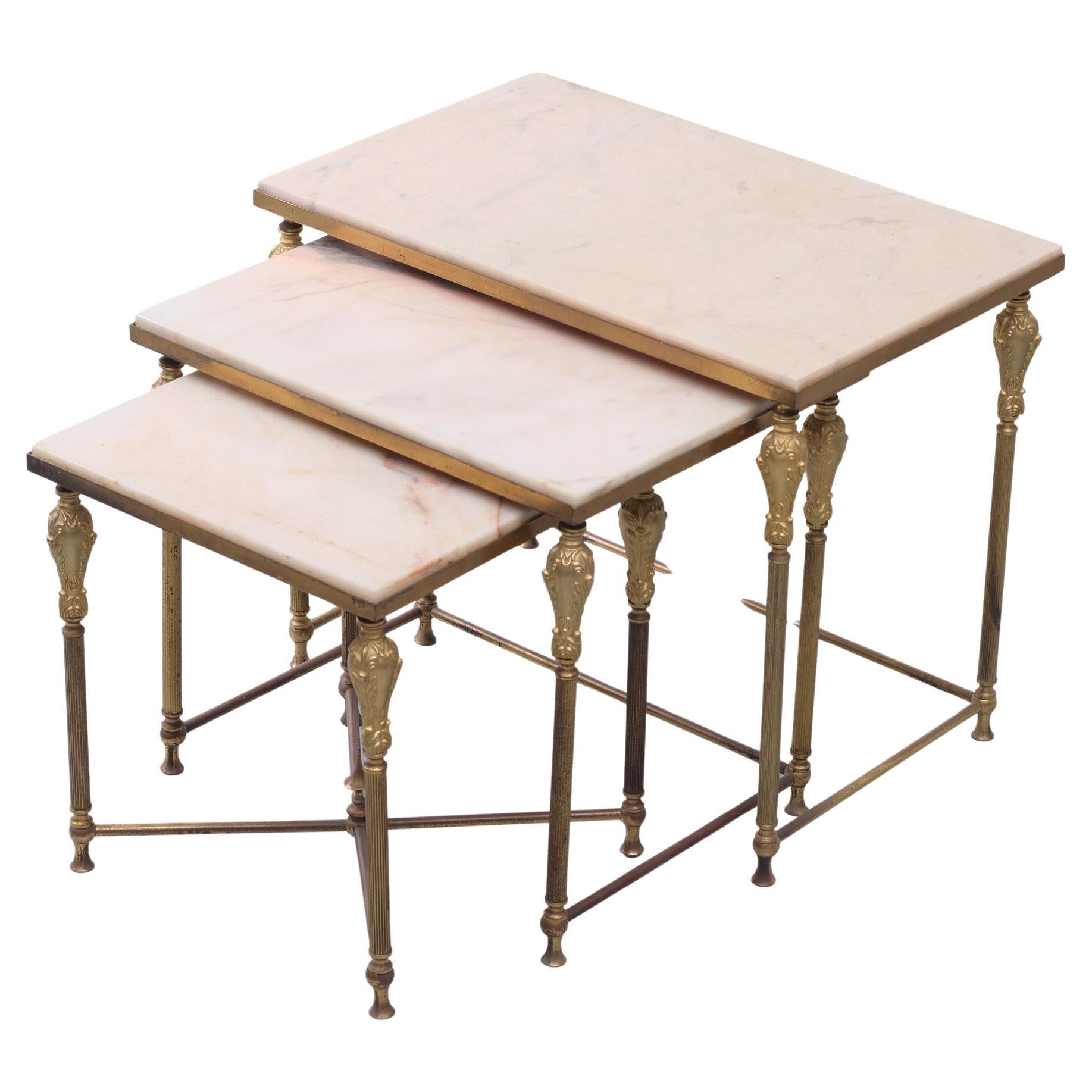 Very nice set of nesting tables. Brass frame, comes with a Marble top. 
1950s France Maison Jansen.
 