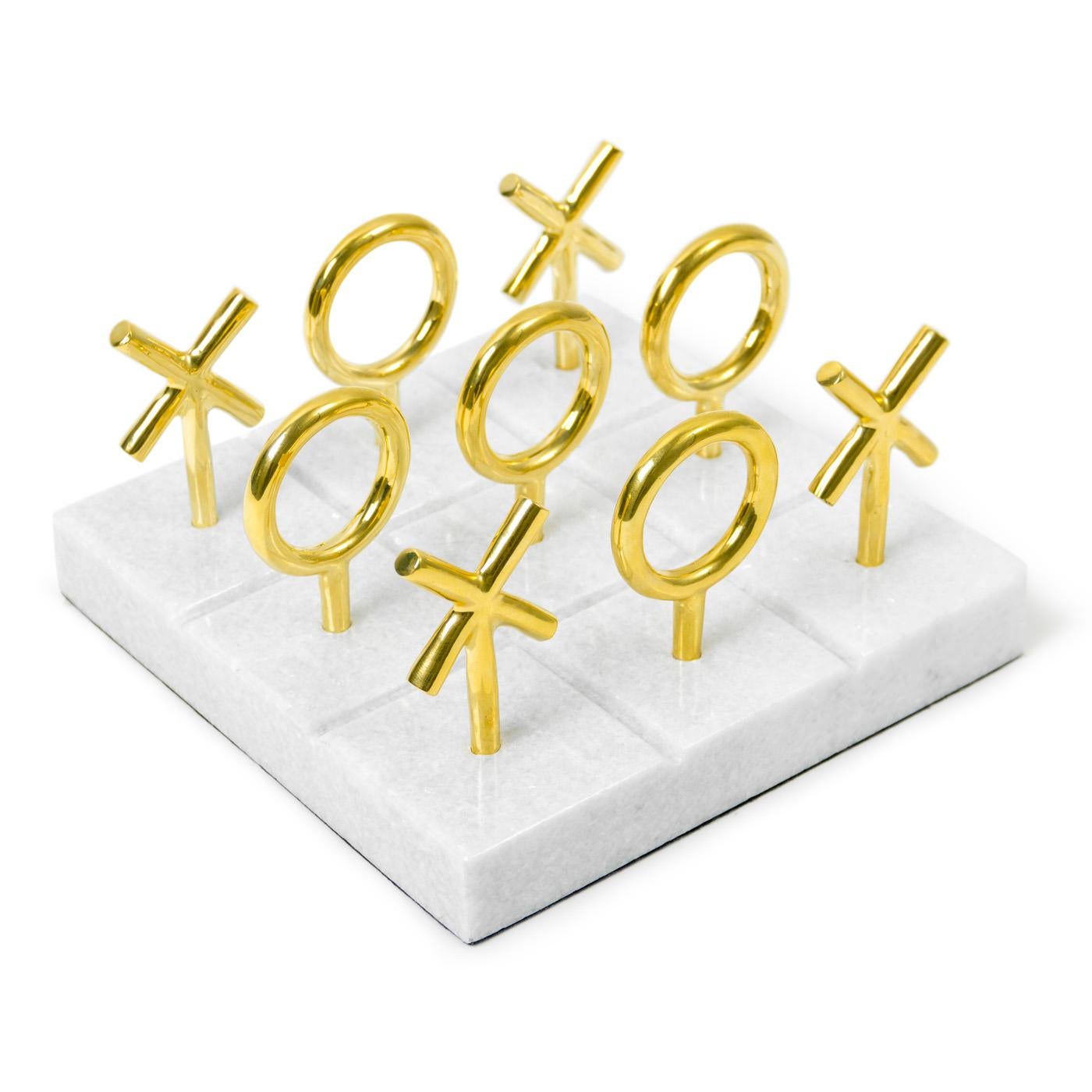 Raise your game. Play to win with our posh brass and marble Tic-Tac-Toe set. The grooved marble base is the perfect board for our sculptural brass playing pieces. Each piece in our collection of brass bibelots is designed and sculpted by Jonathan