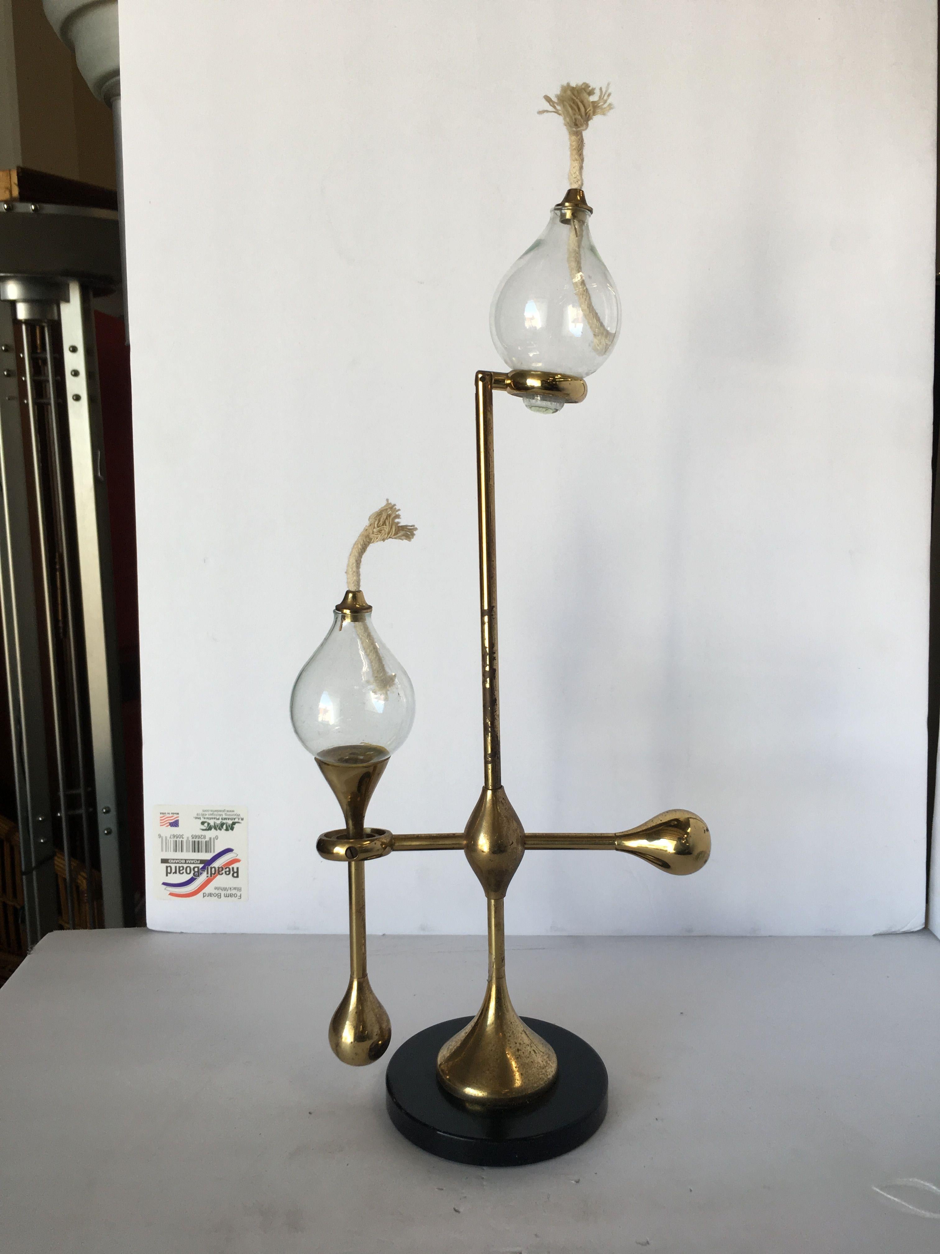 Vintage brass gyroscope ship oil lamp fixed to a marble base. The lamp features a removable glass oil lamp to a fixed position and a gyroscopic side light consisting of a single glass oil lamp.
