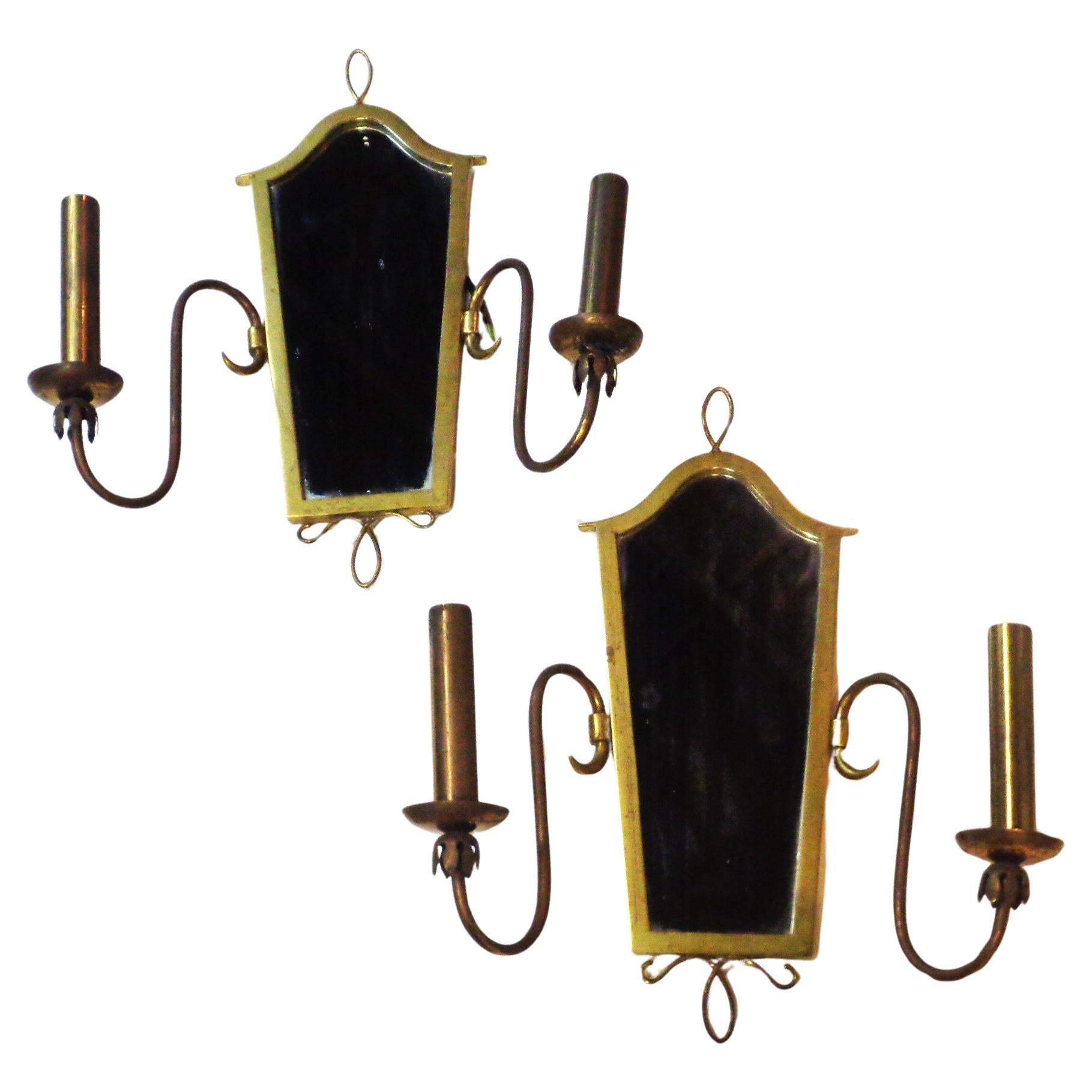Pair of brass and mirror two light wall sconces in the style of Gio Ponti. French or Italian in origin. Circa 1940-1960. Look at all pictures and read condition report in comment section.