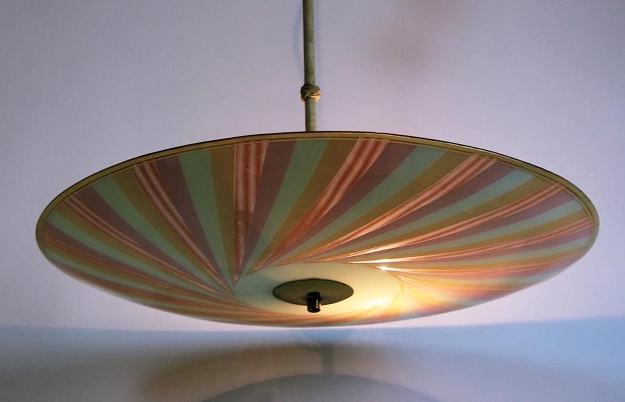 Rare 1950s Italian design slim glass plate ceiling lamp. Quality object in undamaged condition.