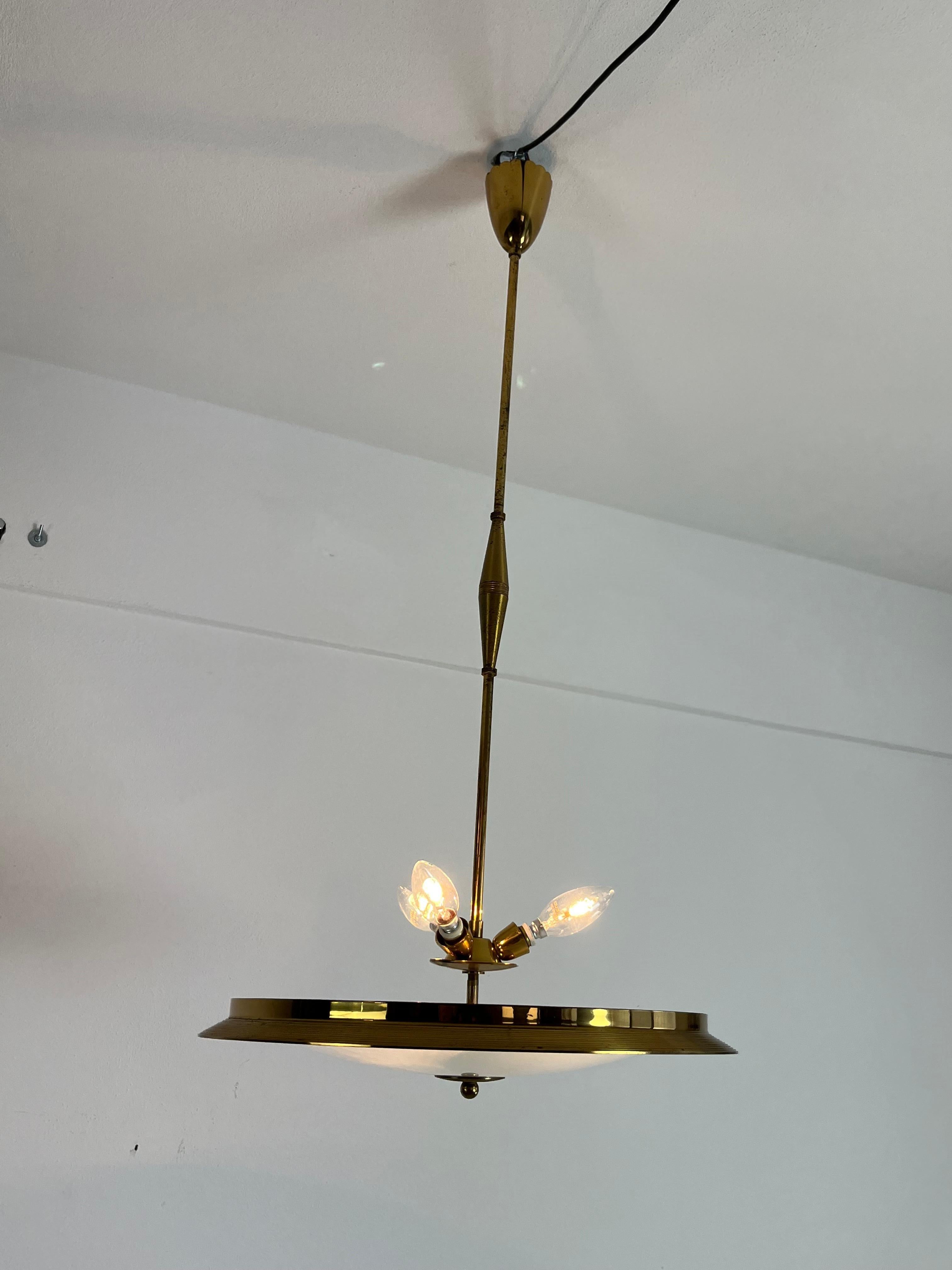 Brass and Murano glass chandelier, Italian design 1950s
Three lights, e14 lamps.
Good condition, small signs of aging.