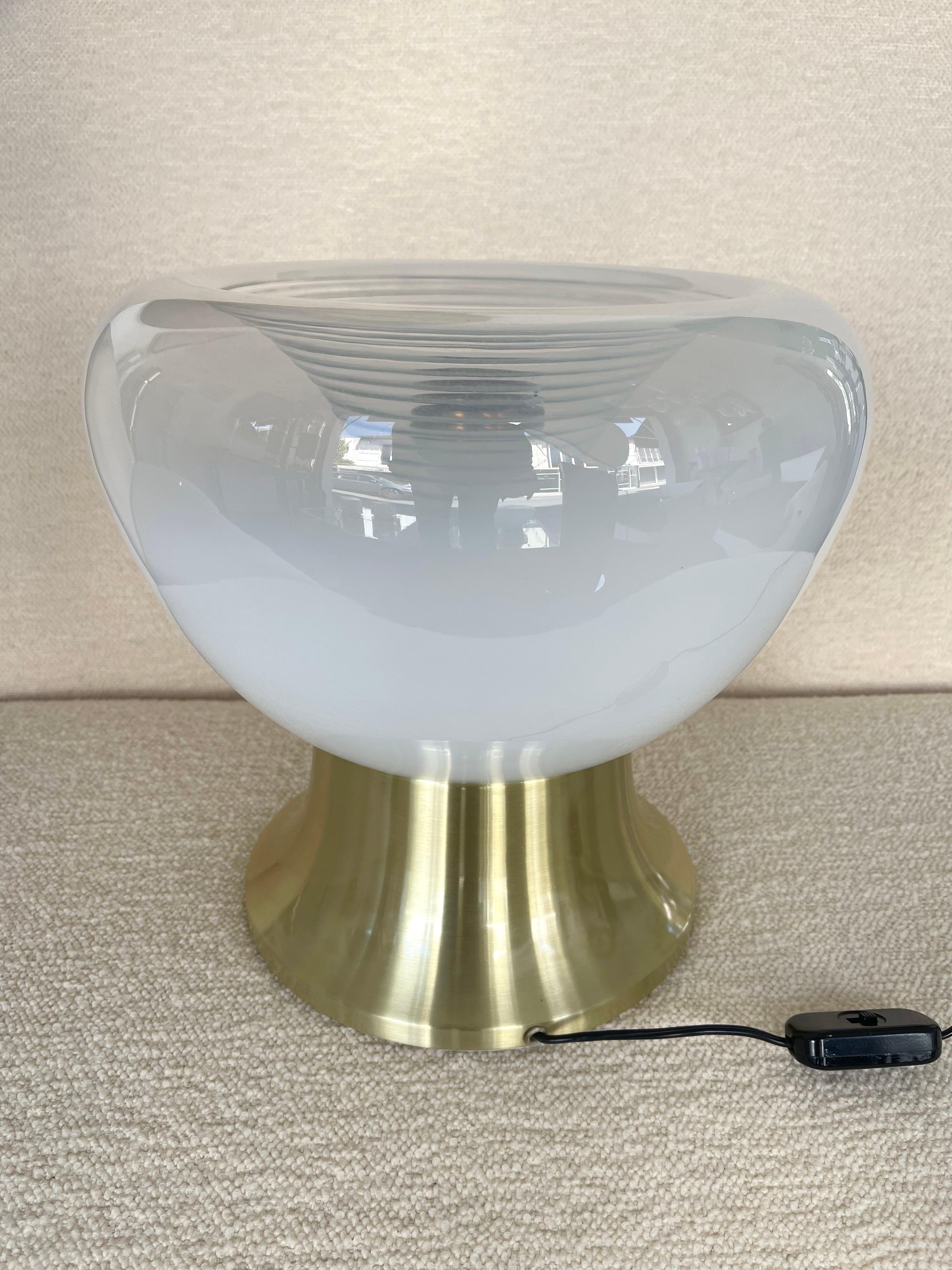 Table or bedside lamp in satin brass and white smoke blown Murano glass by the italian designer editor VeArt. Come with brass bulb shade. Famous design like Reggiani, Sciolari, Stilux, Stilnovo, Angelo Brotto for Esperia, Aldo Carlo Nason for