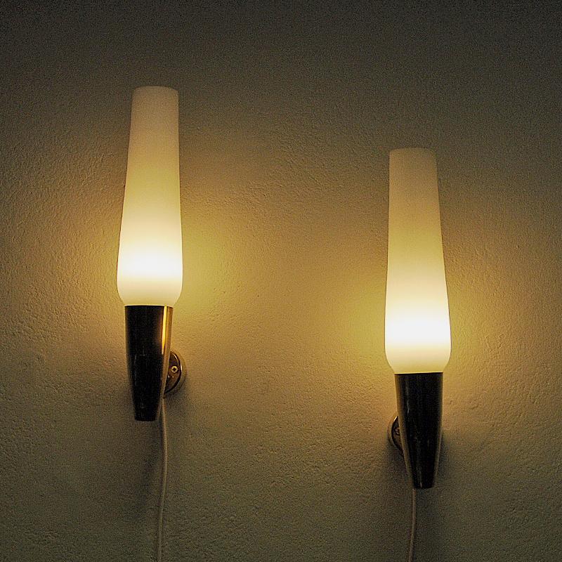 Polished Brass and opaline glass cylindershaped wall lamp pair by Asea - Sweden 1950s For Sale