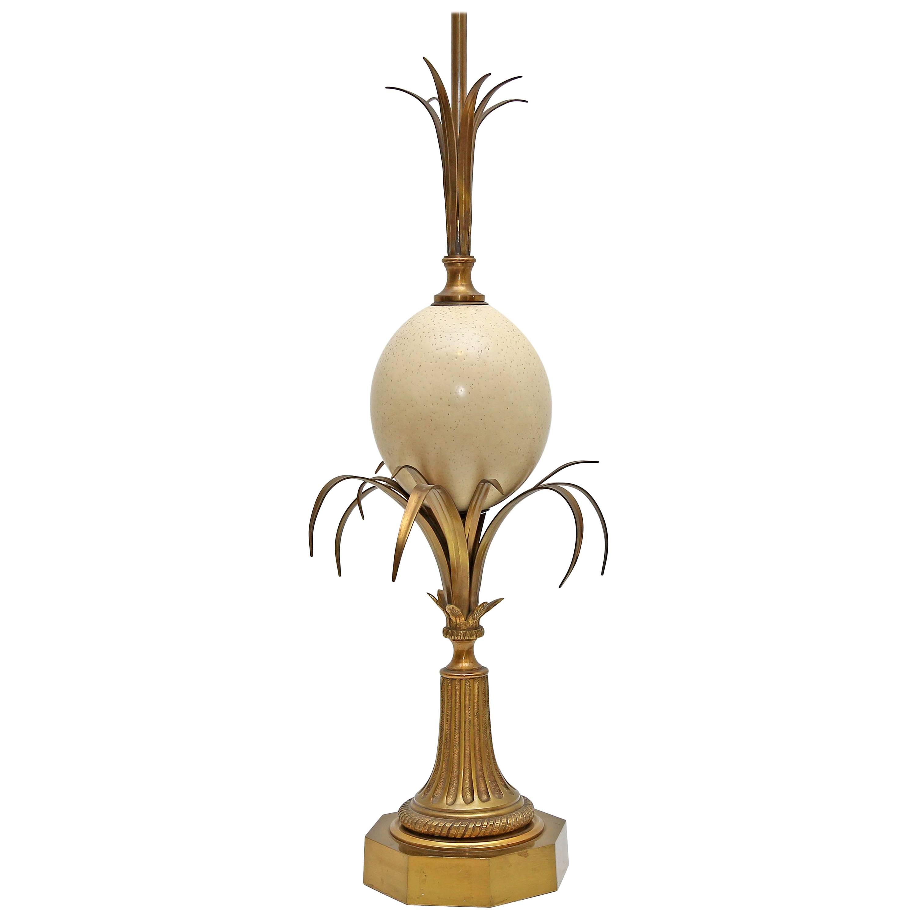 Hollywood Regency brass and ostrich eggshell lamp by Maison Charles, Paris.