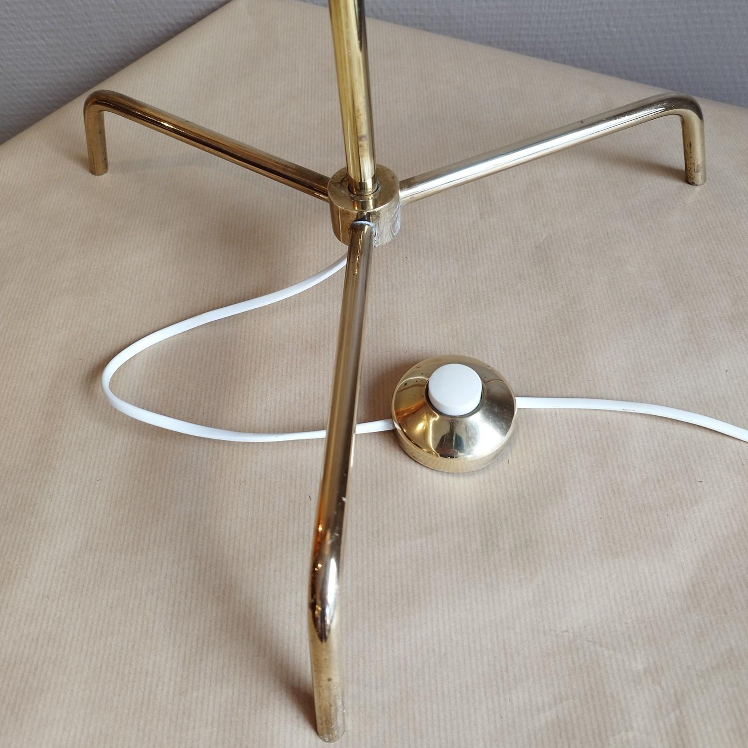 Gorgeous brass and painted metal floor lamp in the quality of Lunel productions. It has been rewired. The floor switch is in brass. 