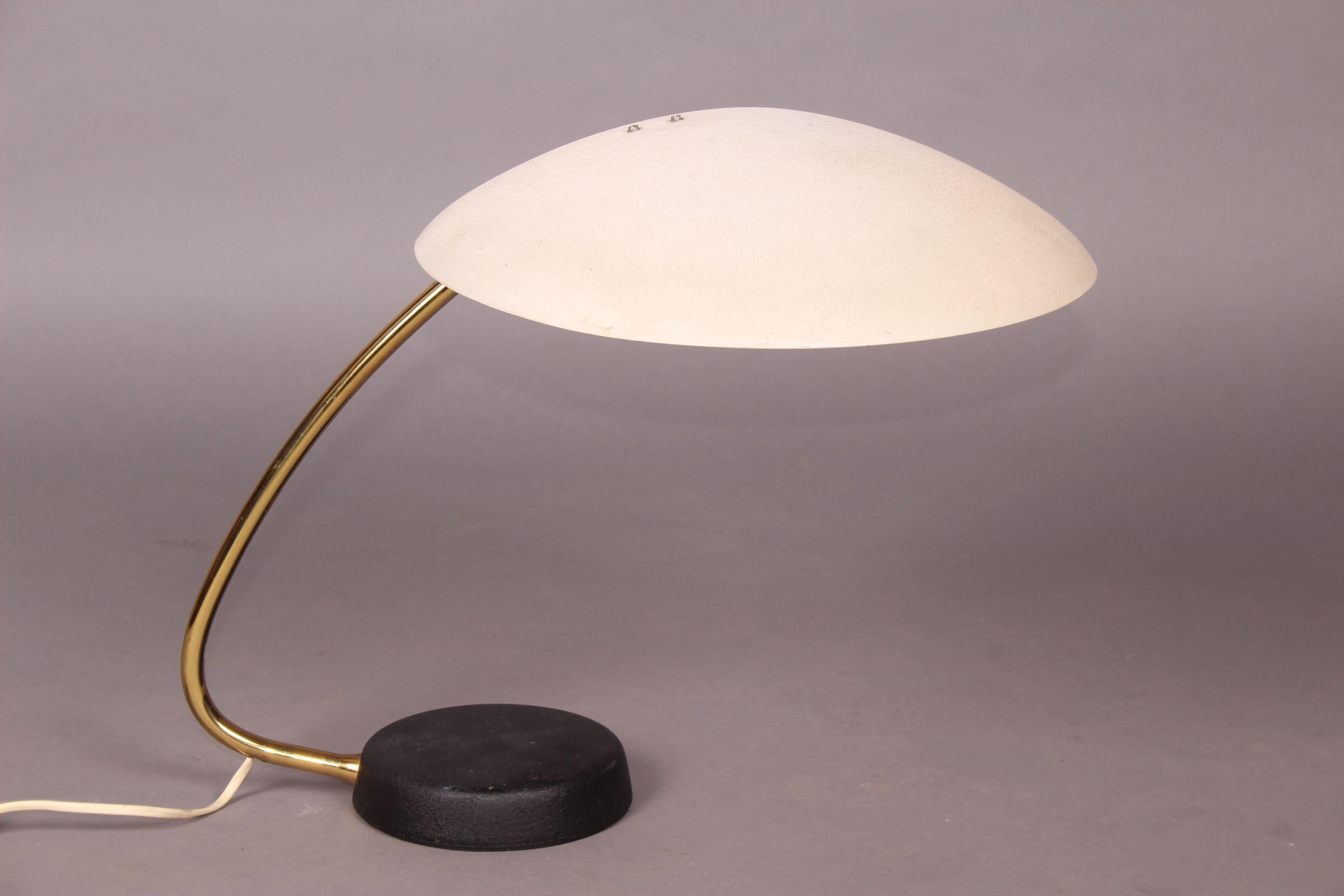 Brass and painted metal table lamp.