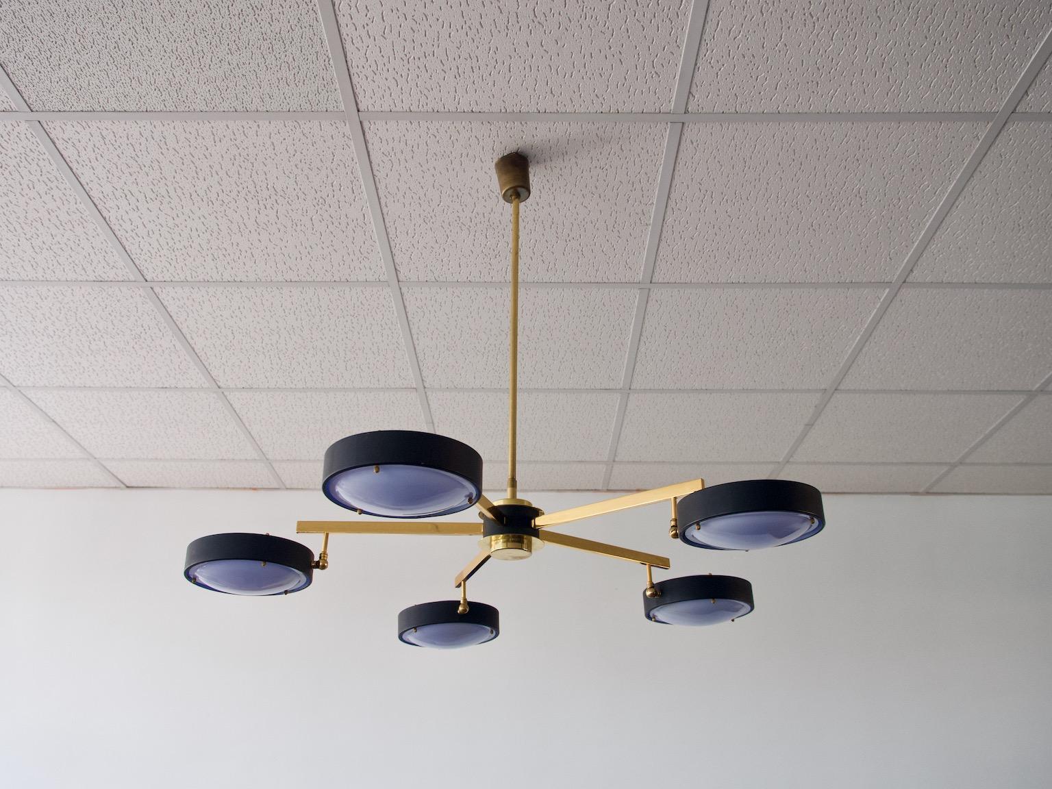 Beautiful brass, painted aluminum and slightly blue colored plexiglass ceiling lamp with five round lights from the 1960s. Produced by G.C.M.E.
