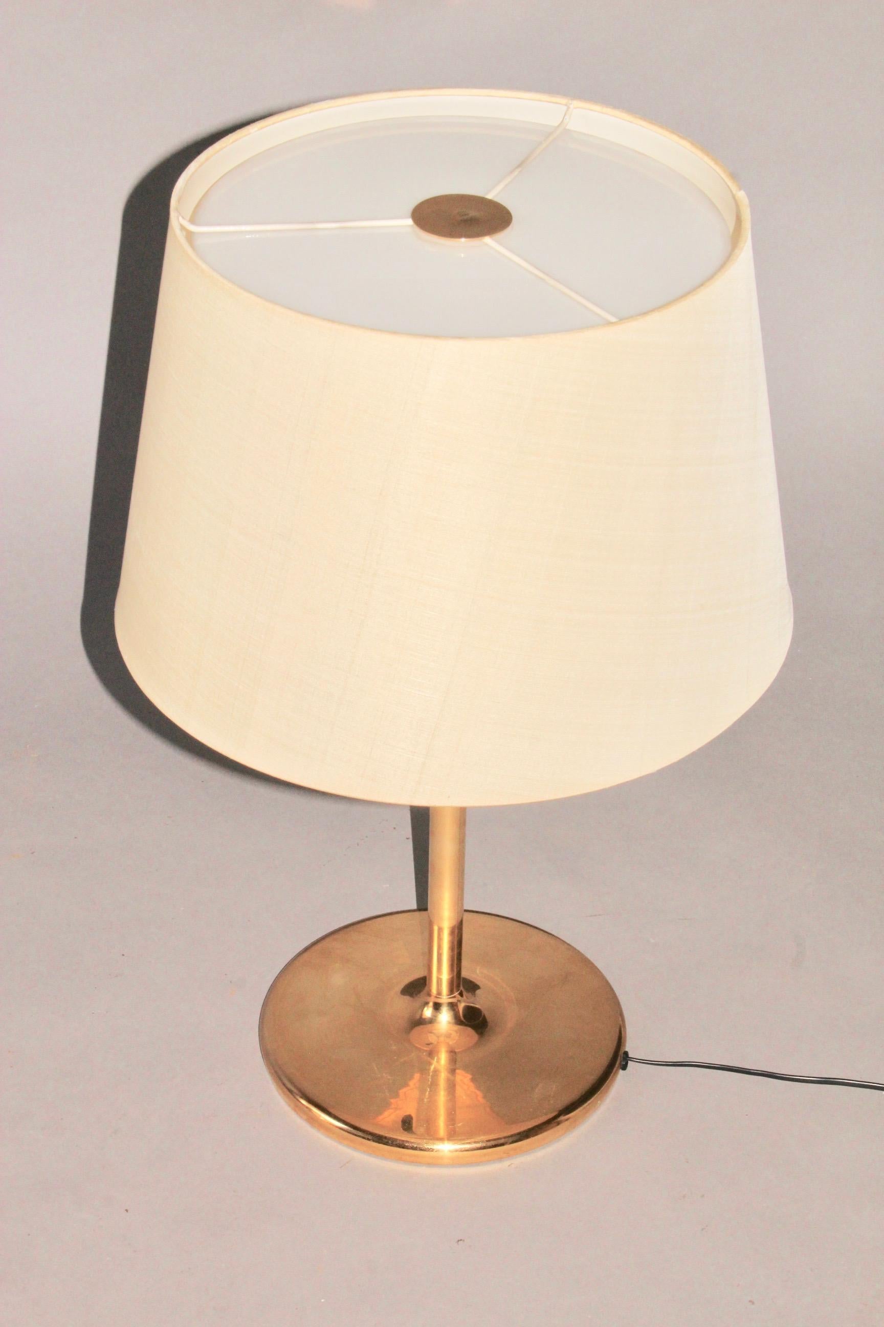 Brass and plexiglass table lamp.