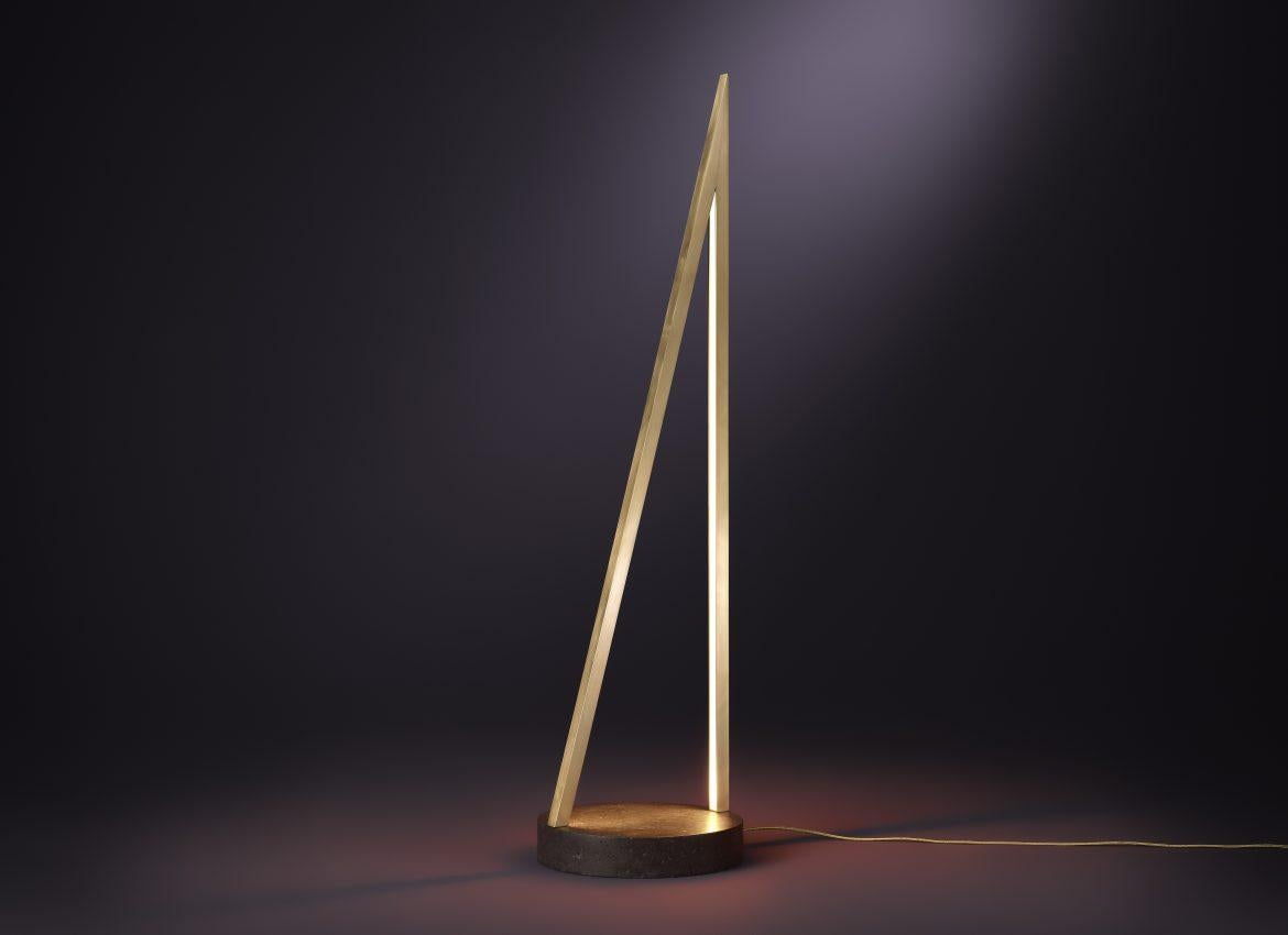 Contemporary Brass and Quartz Crystal Floor Light - Archimedes by Christopher Boots

The Alchemical symbol for fire is a triangle, point rising like a flame.
Channeling the soaring energy of the triangle, ARCHIMEDES embodies a composite cement