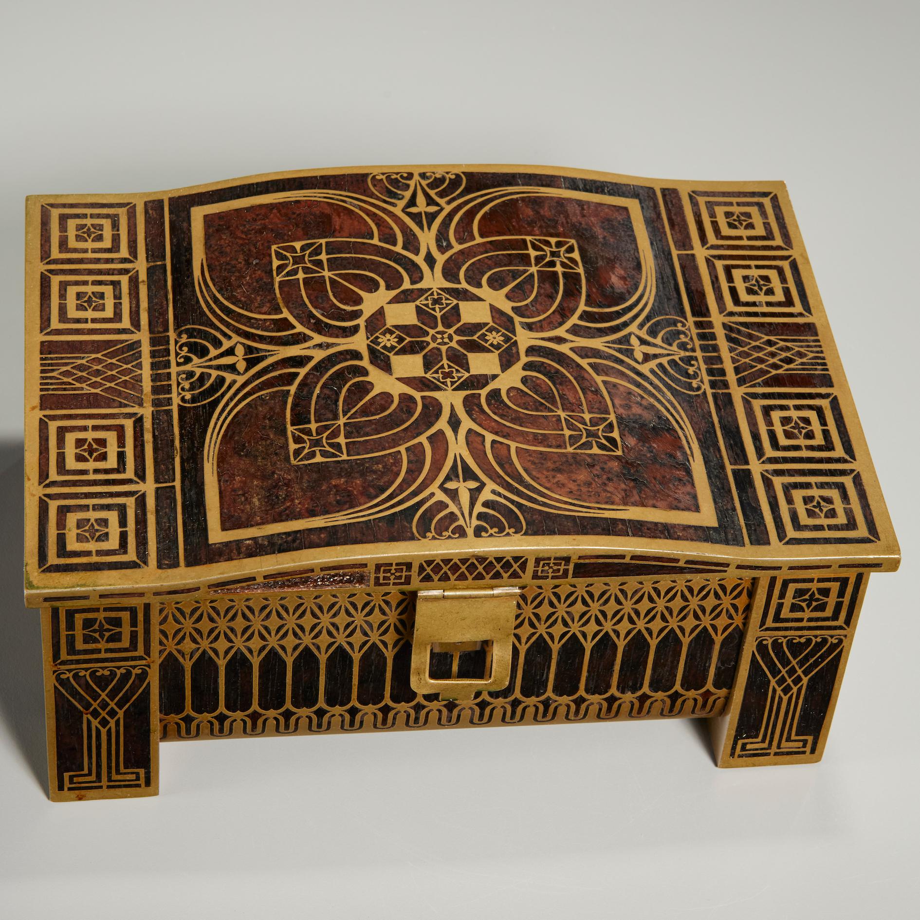 Brass and Rosewood German Art Nouveau Jugendstil Period Jewelry by Erhard Sohne decorated with inlaid brass arabesque motifs.