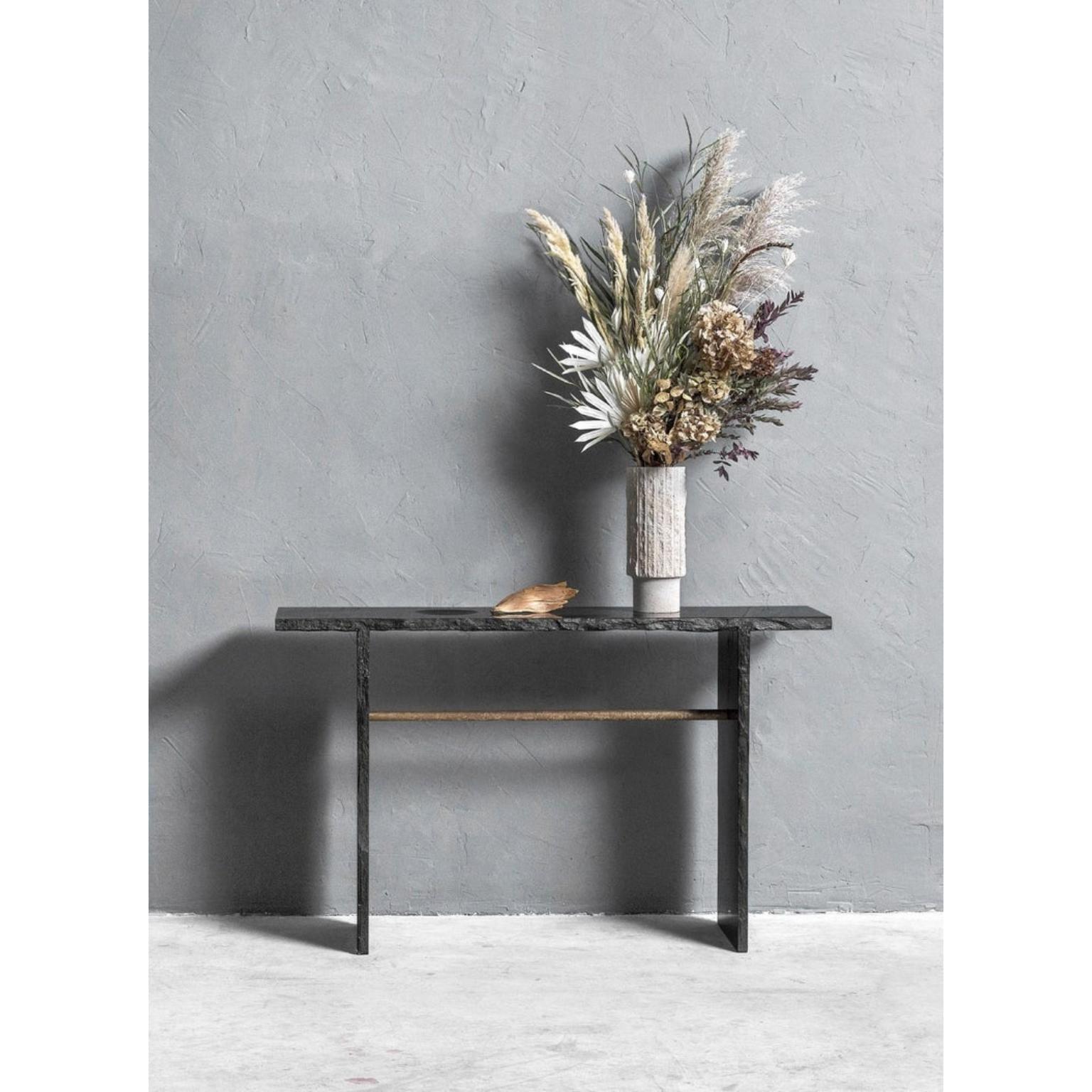 Brass and slate sculpted console by Frederic Saulou
Intègre
Console
Black Slate, chemical engrave brass
Measures: L 150 x W 35 x H 90 cm, approximately 130 kg
Limited edition of 12
Signed and numbered.

