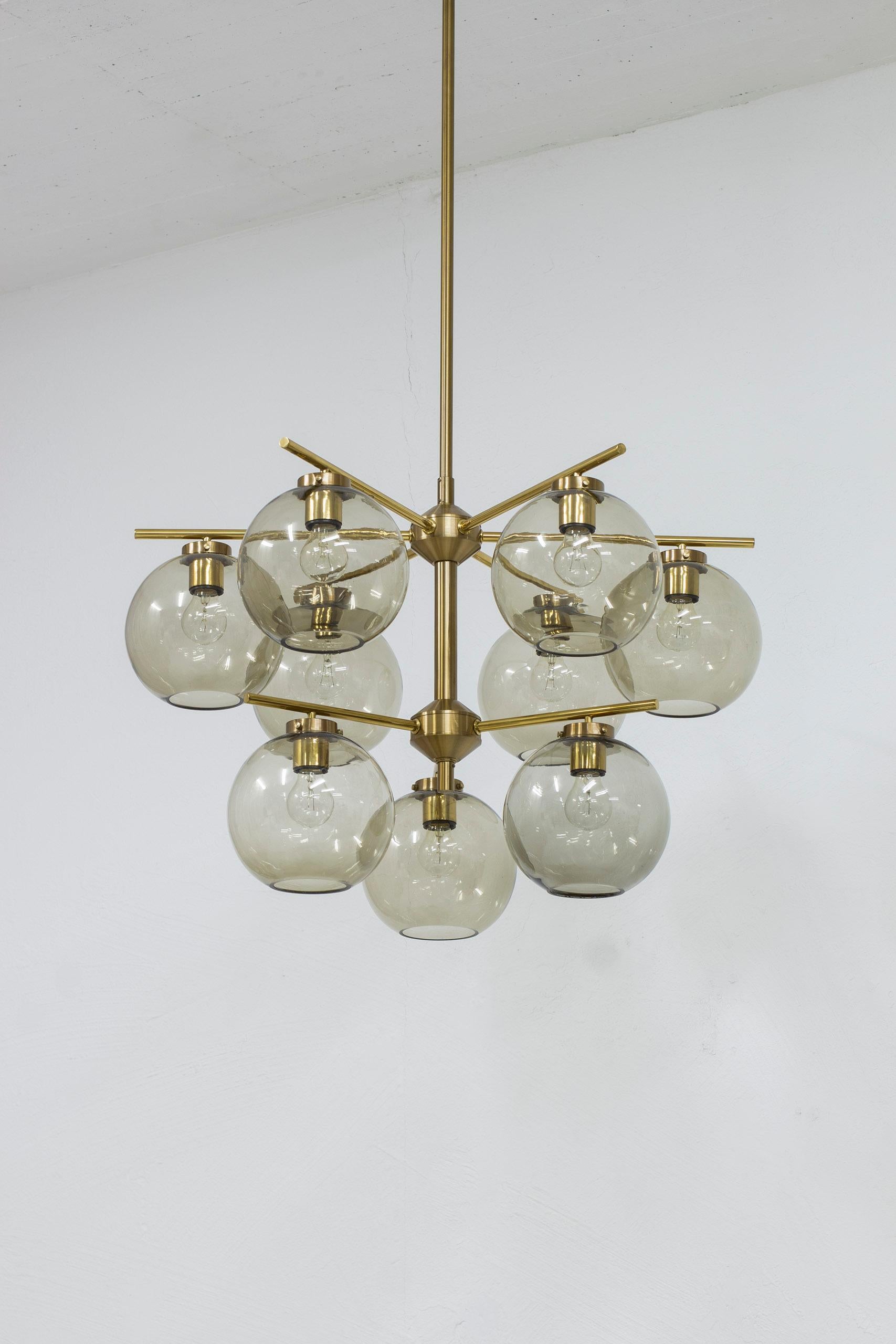 Scandinavian Modern Brass and smoked glass chandeliers by Holger Johansson, Sweden, 1960s