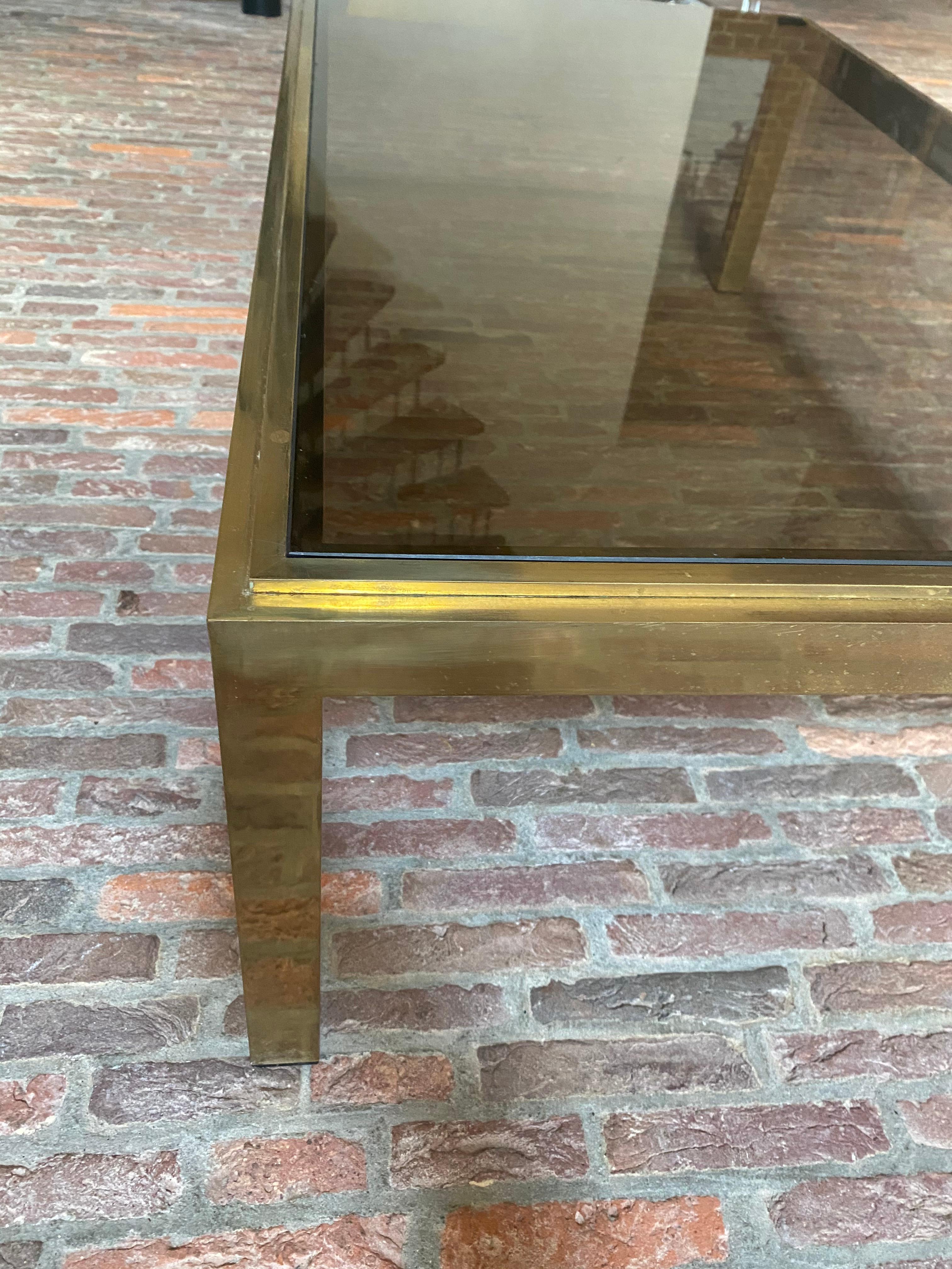 French Brass and Smoked Glass Coffee Table Attributed to Willy Rizzo for Maison Charles For Sale