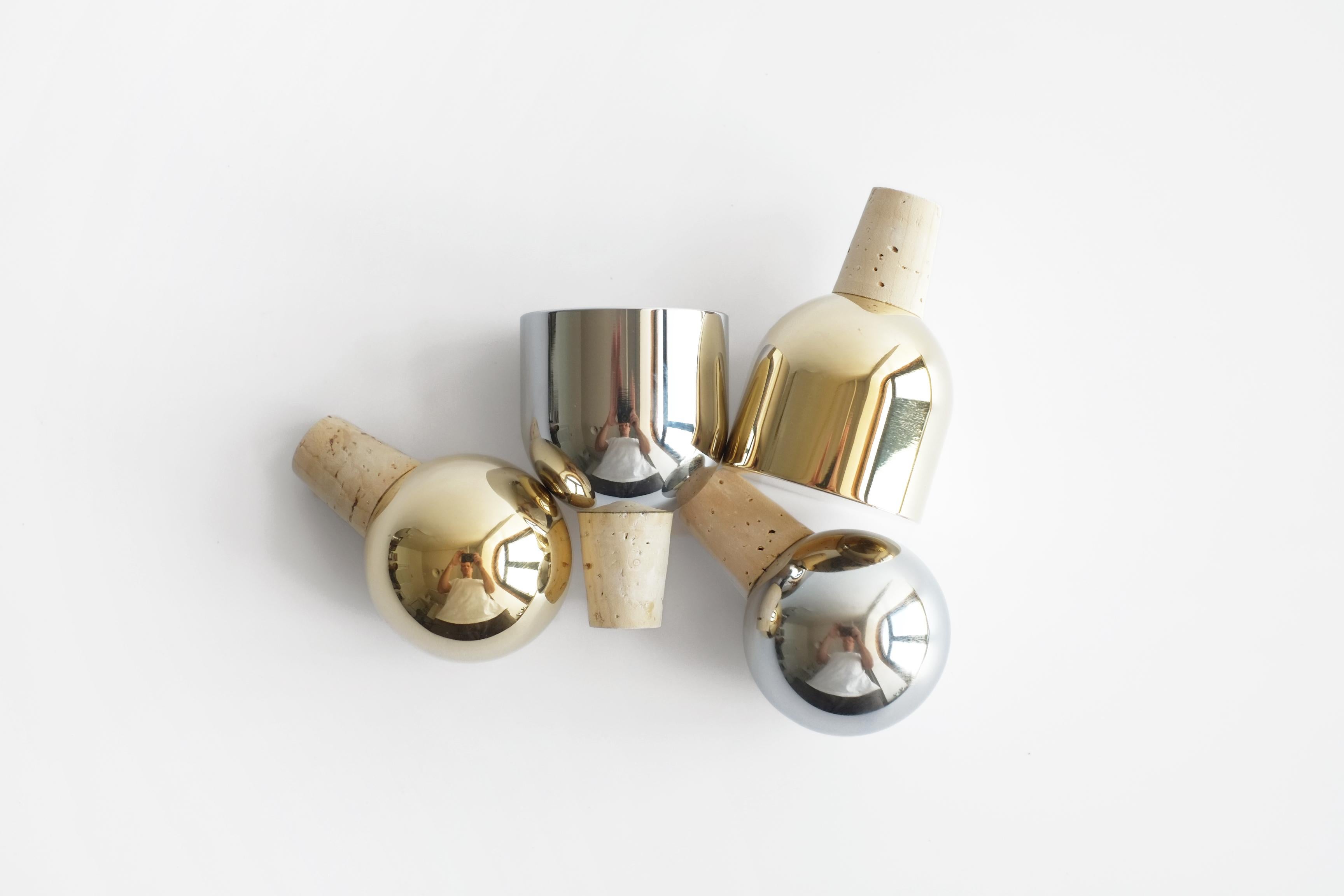 These new sphere and dome shaped wine stoppers appear to float as they sit on top of a favorite bottle of open wine. They will make you want to save some of the bottle for the next day (well, almost). 

The mirror polished finish illuminates the
