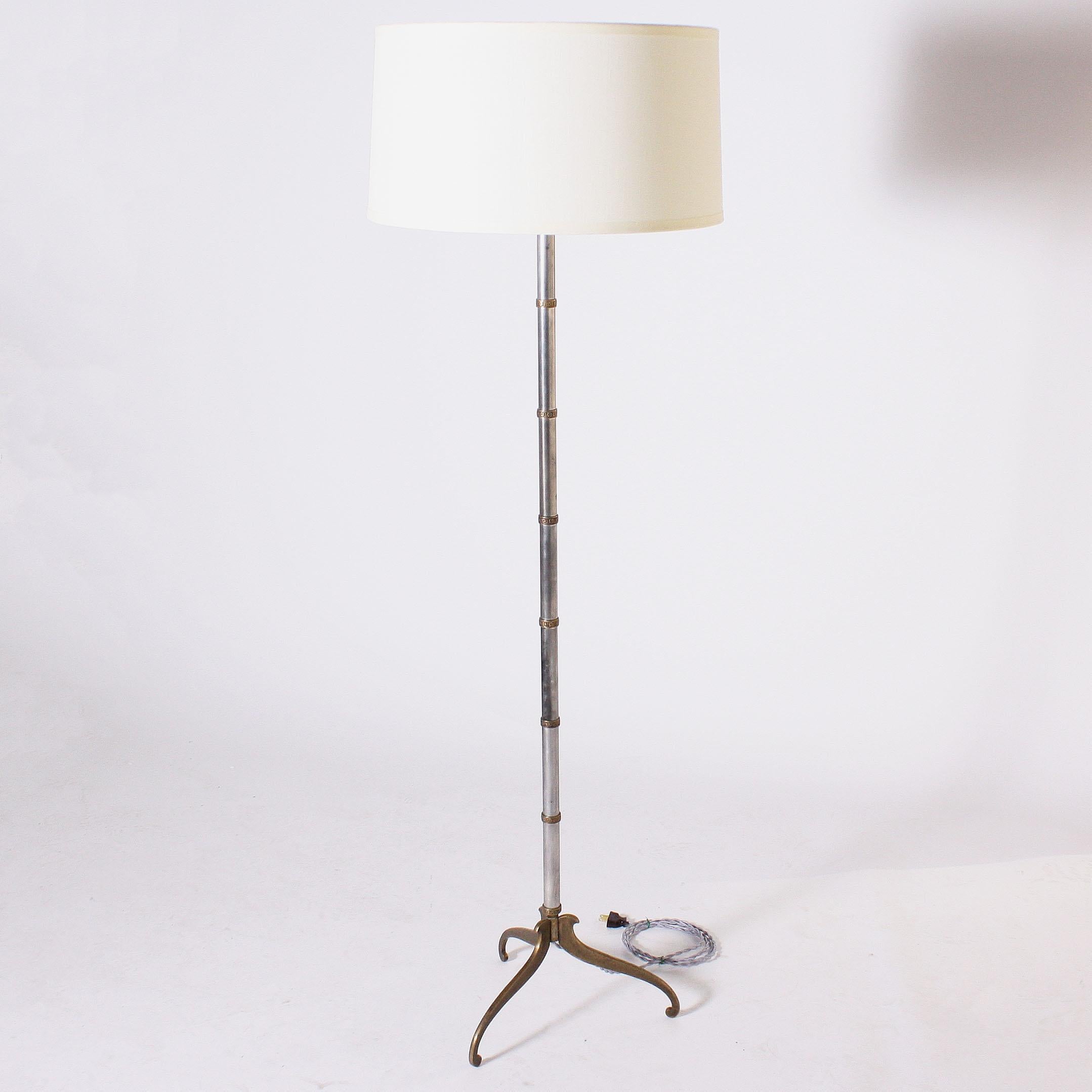 Brass and steel floor lamp, circa 1970.