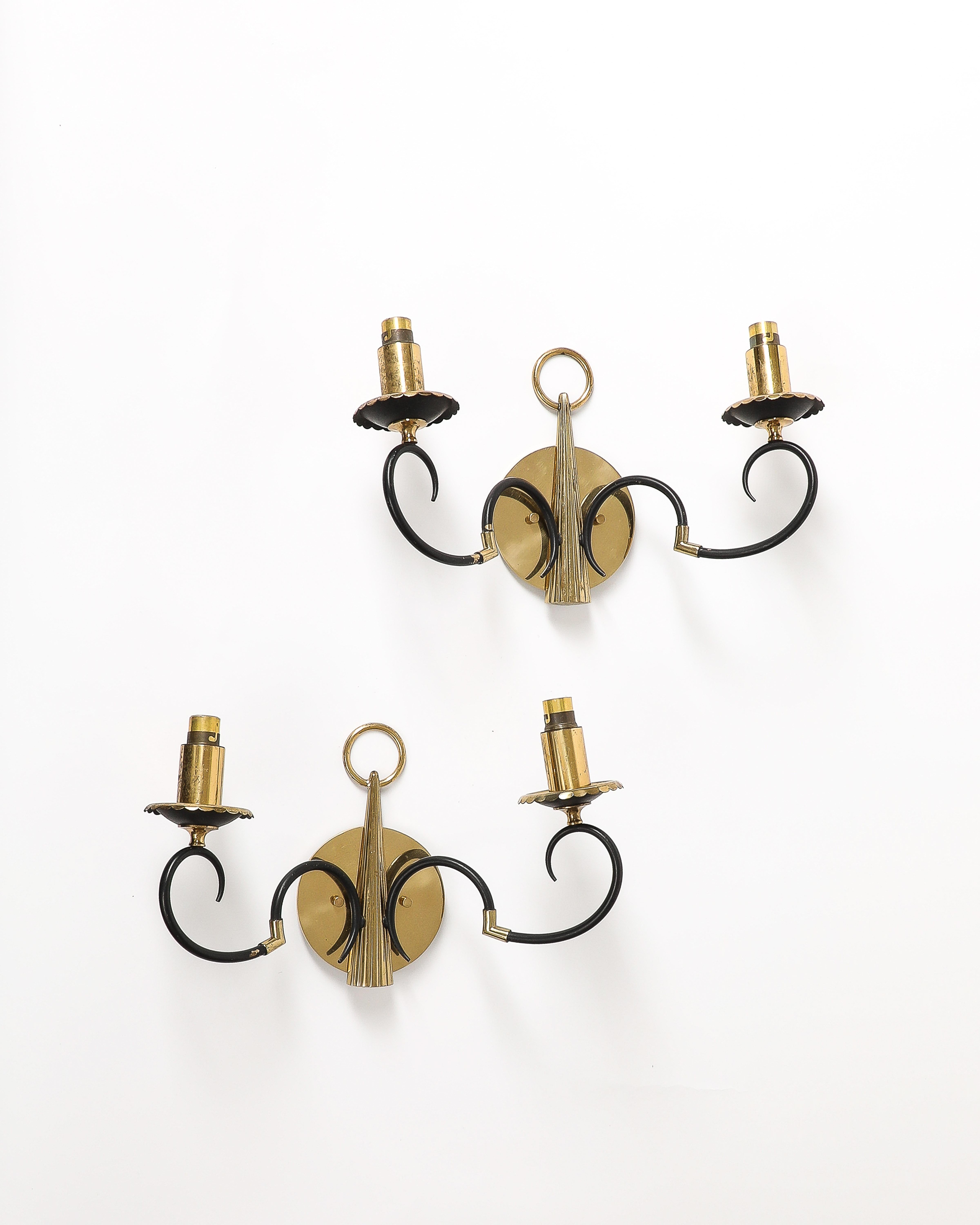 Two available; priced individually.

Unique brass and steel sconces.